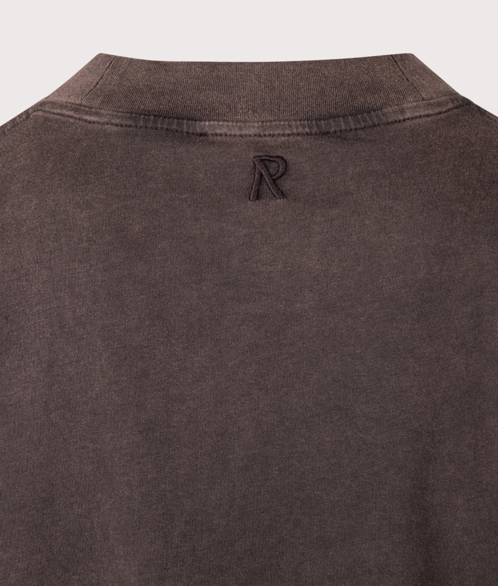 Represent Oversized Initial T-Shirt in  Coffee at EQVVS Menswear. Detail shot.