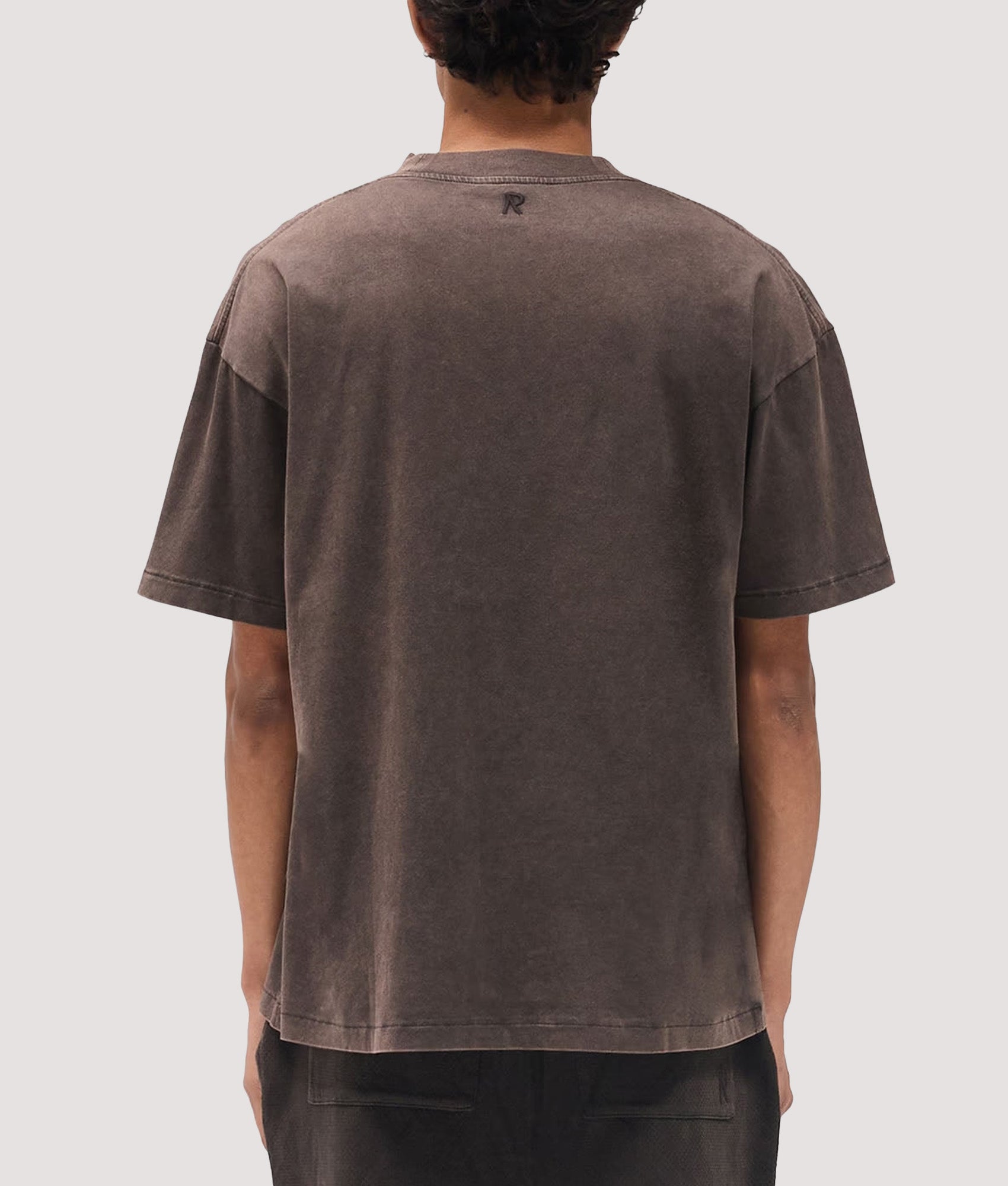 Represent Oversized Initial T-Shirt in  Coffee at EQVVS Menswear. Model back shot.