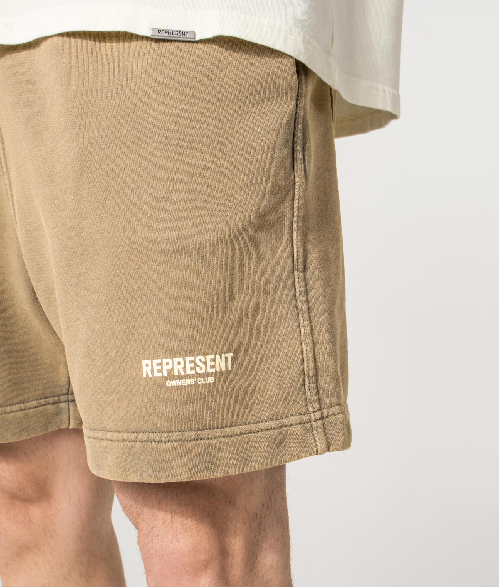 Owners’ Club Shorts in Almond | 100% Cotton | REPRESENT | EQVVS | Front angle detail model shot 