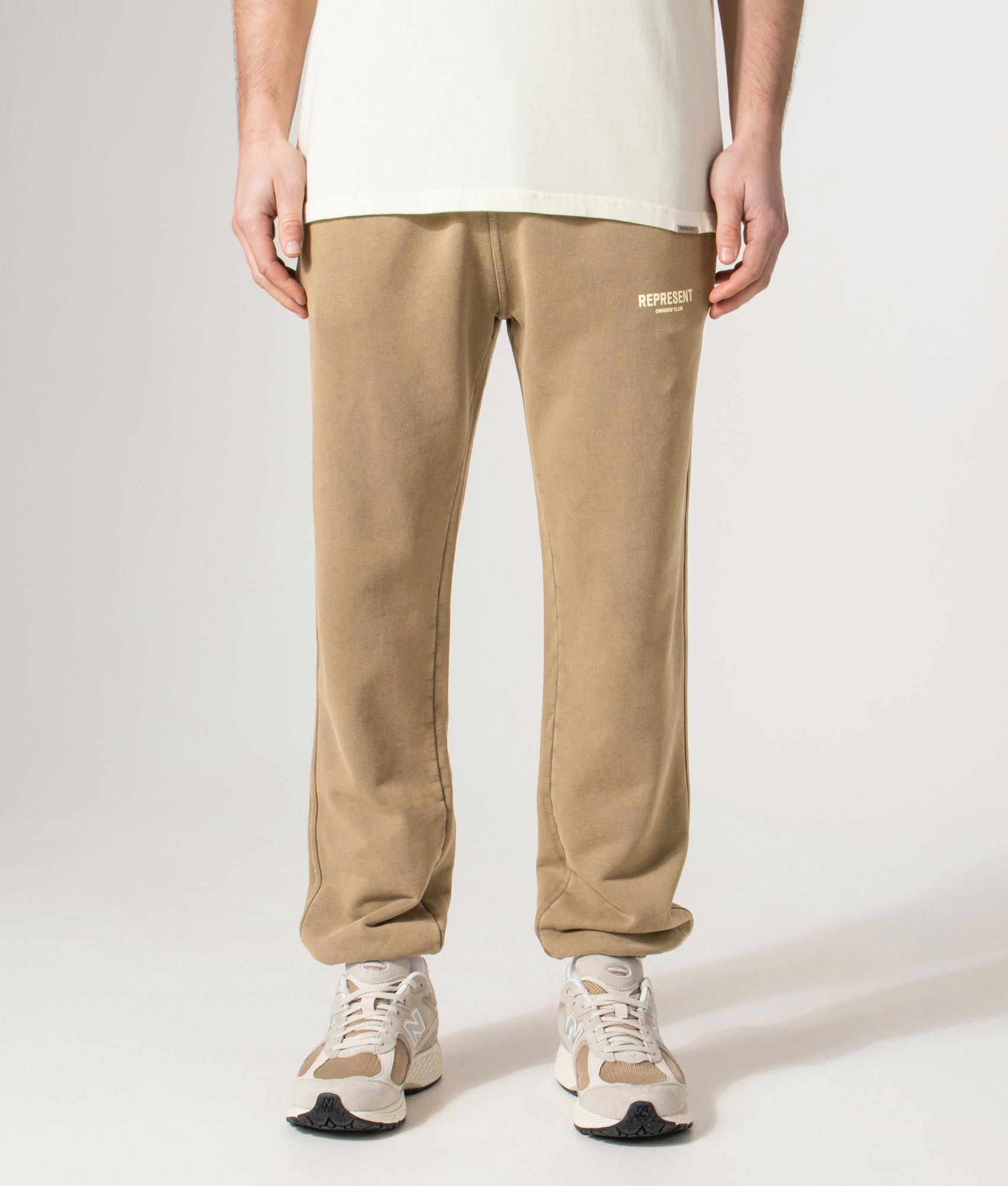 Owners’ Club Joggers in Almond | 100% Cotton | REPRESENT | EQVVS | Front model shot 