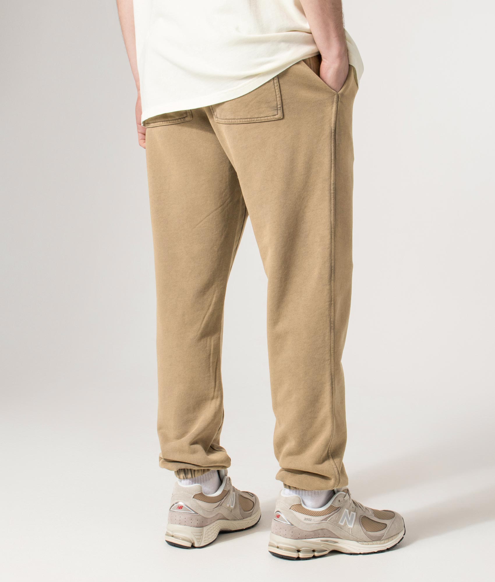 Owners’ Club Joggers in Almond | 100% Cotton | REPRESENT | EQVVS | Back angle model shot 