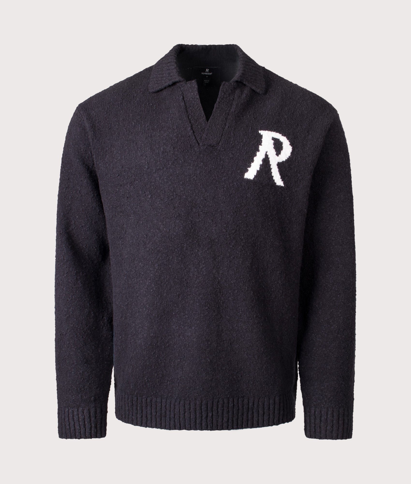 REPRESENT Knitted Boucle Long Sleeve Polo Shirt in Black at EQVVS Menswear. Front shot. 