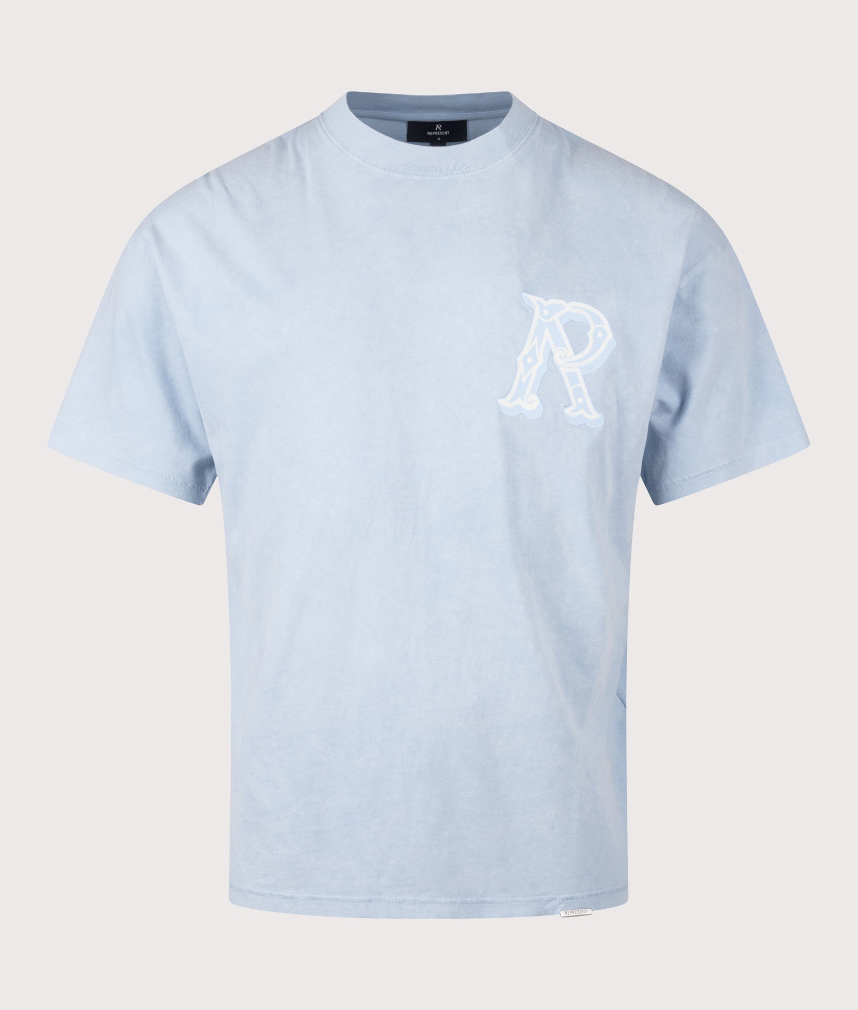REPRESENT Oversized Fit Western Initial T-Shirt in Mountain Bluebird at EQVVS Menswear. Front shot.
