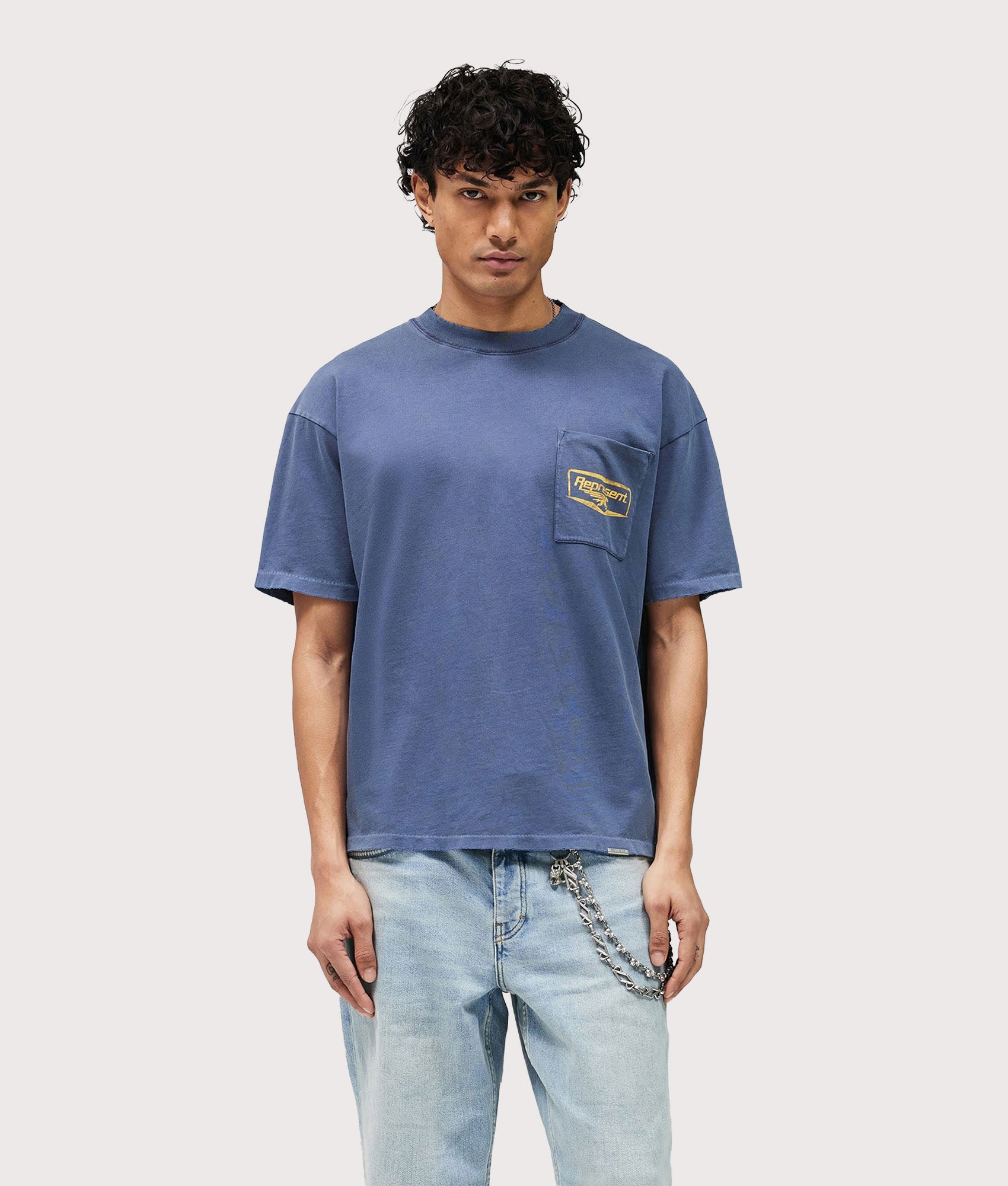 Represent Nothing Faster T-Shirt in Indigo at EQVVS Menswear. Model front shot.