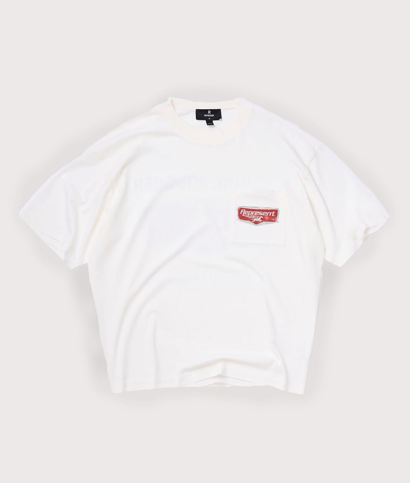 Represent Oversized Fit Nothing Faster T-Shirt in Flat White at EQVVS Menswear. Front shot.