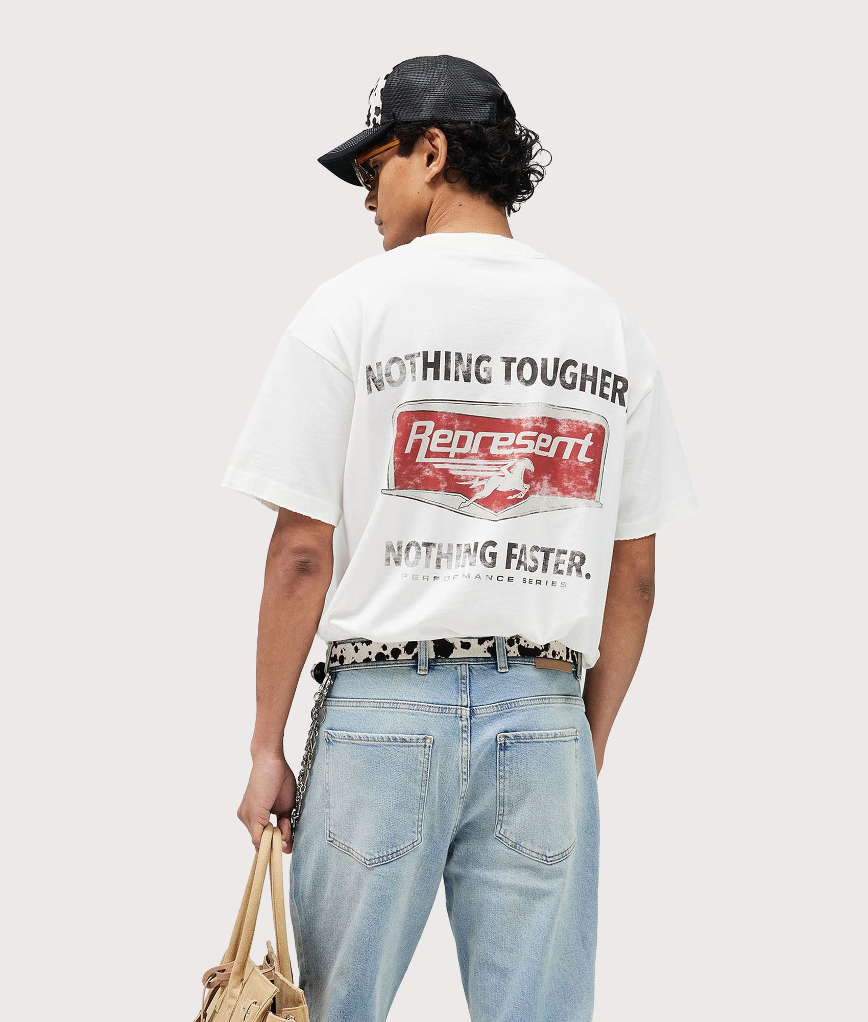 Represent Oversized Fit Nothing Faster T-Shirt in Flat White at EQVVS Menswear. Model back shot.