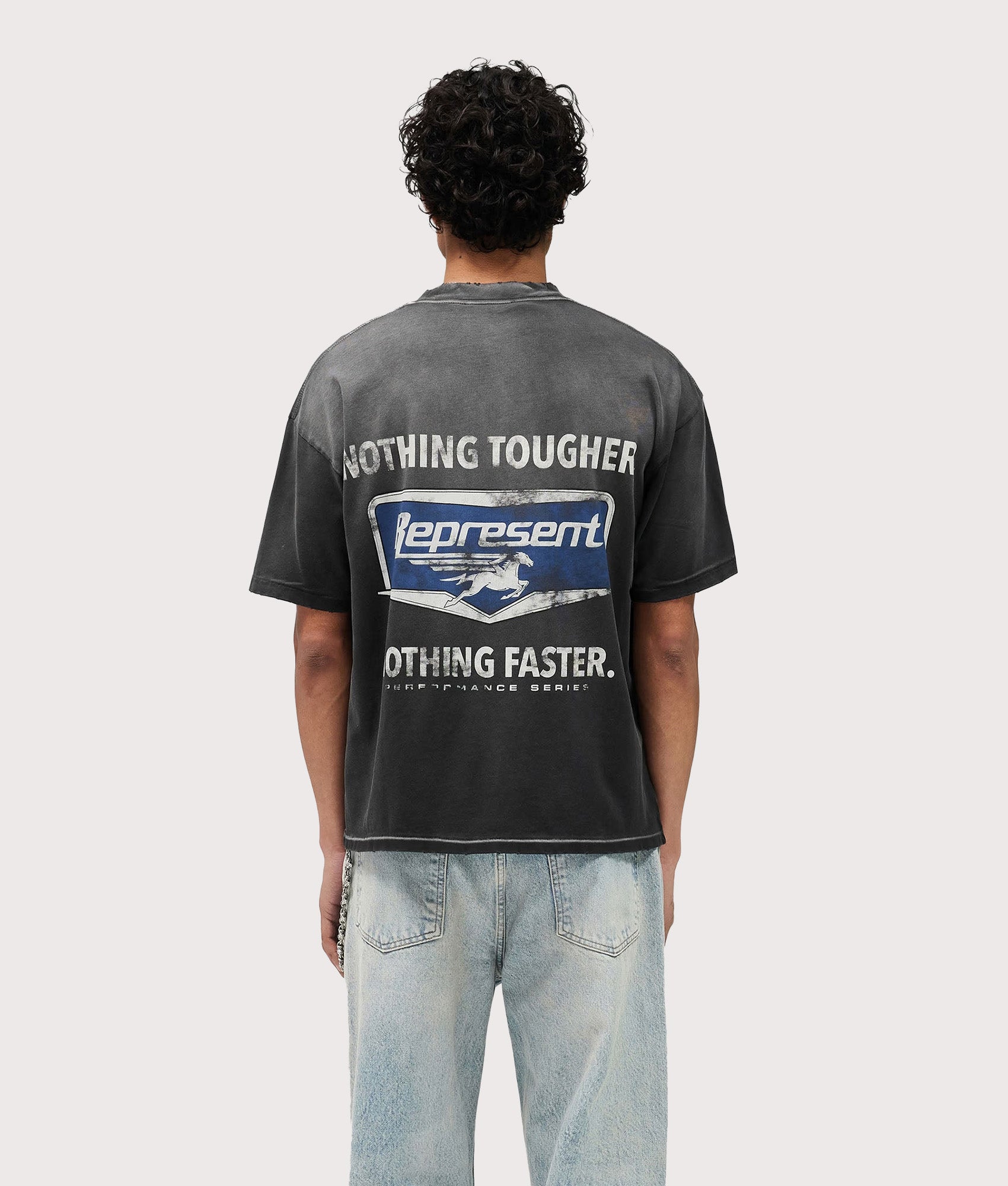 Represent Oversized Fit Nothing Faster T-Shirt in Stained Black at EQVVS Menswear. Model back shot.