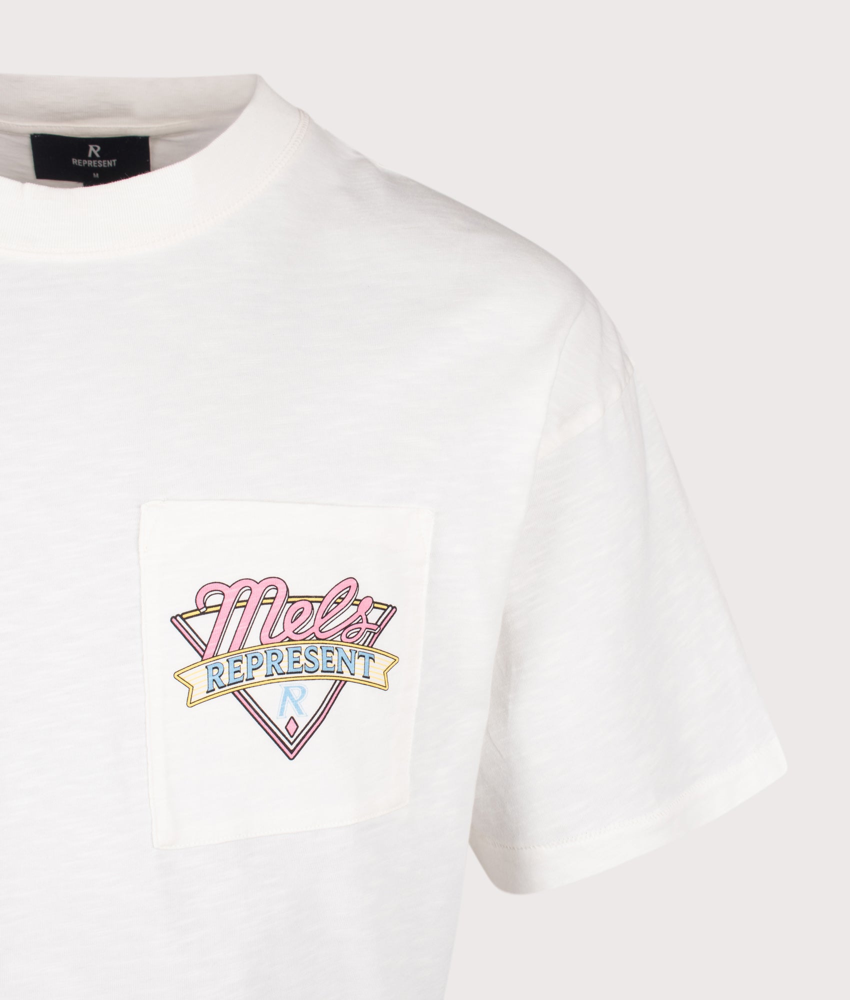 REPRESENT Mel's Diner T-Shirt in Flat White at EQVVS Menswear. Detail shot.