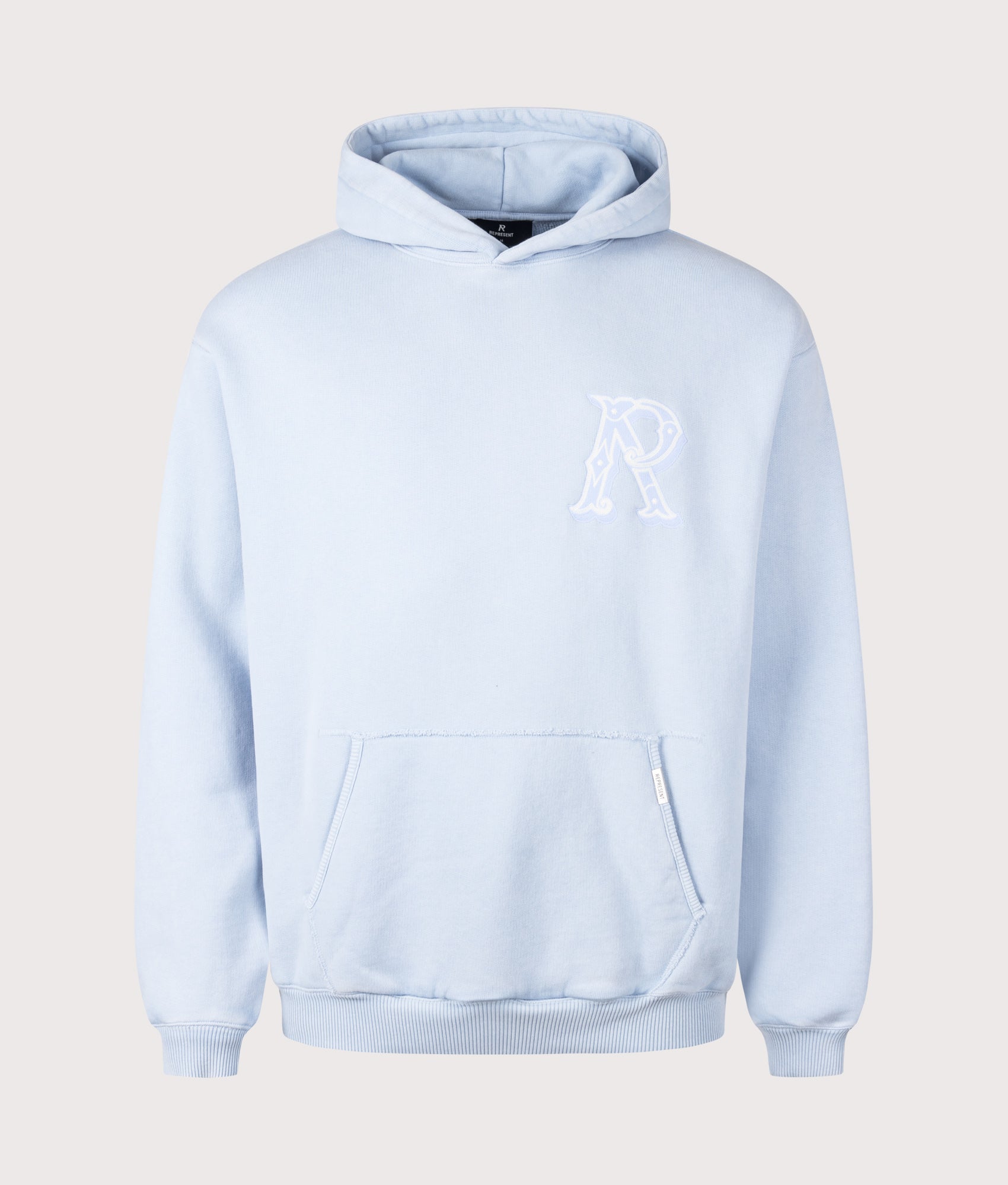 REPRESENT Western Initial Hoodie in Mountain Bluebird at EQVVS Menswear. Front shot.