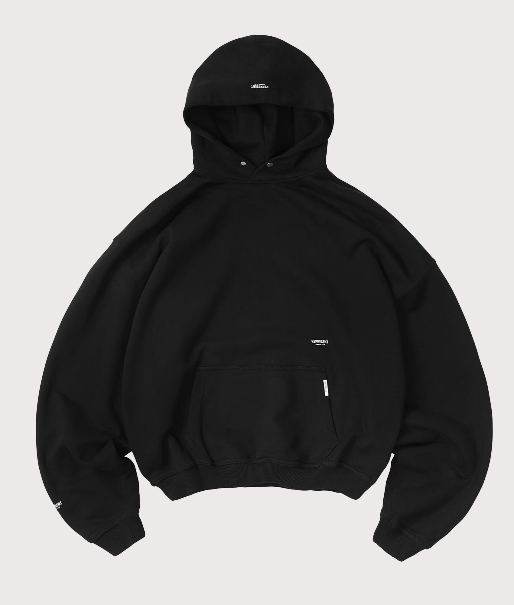 Represent Oversized Micro Owners Club Hoodie in Jet Black at EQVVS Menswear. Front shot.