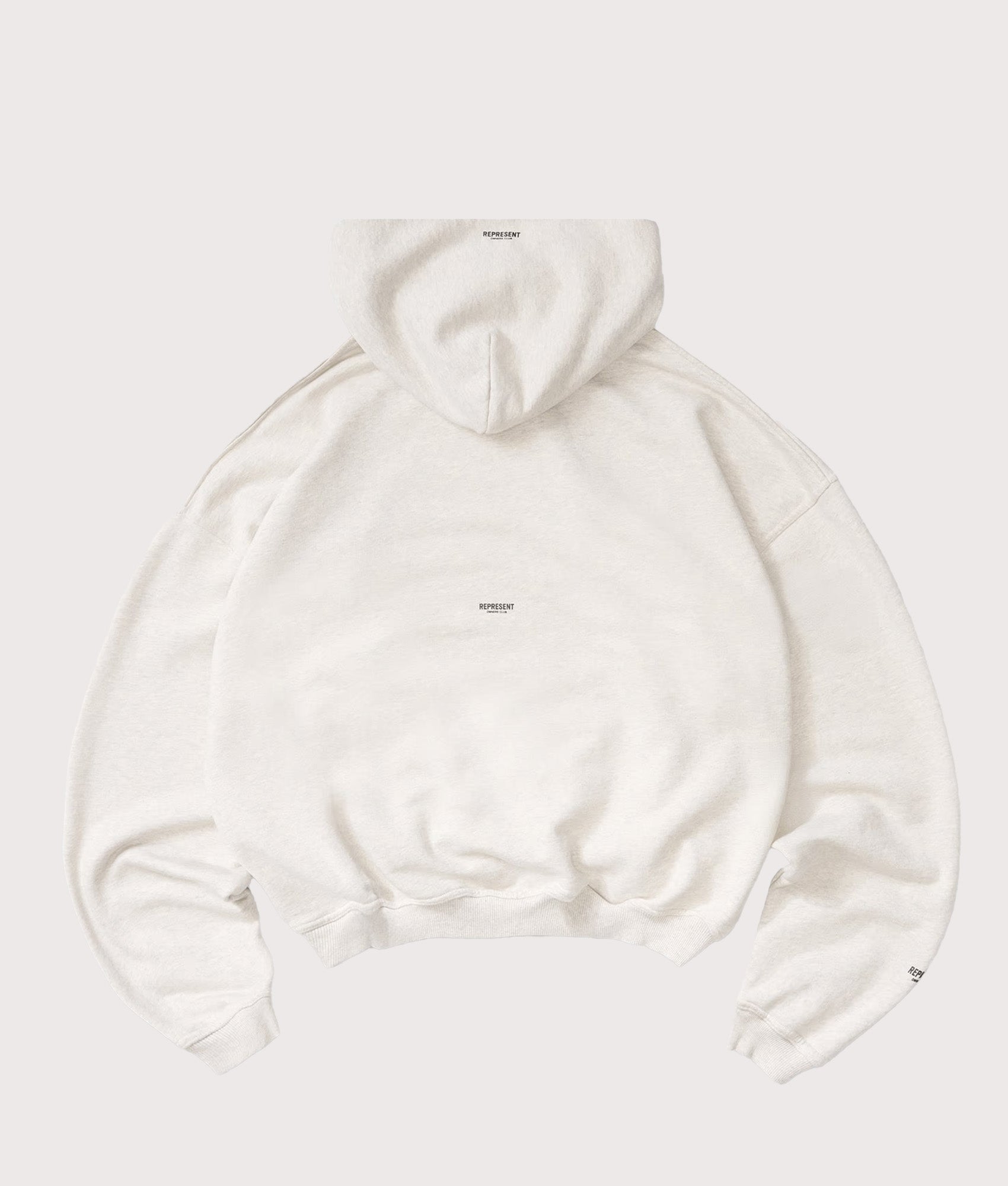 Represent Oversized Micro Owners Club Hoodie in Cream Marl at EQVVS Menswear. Back shot.