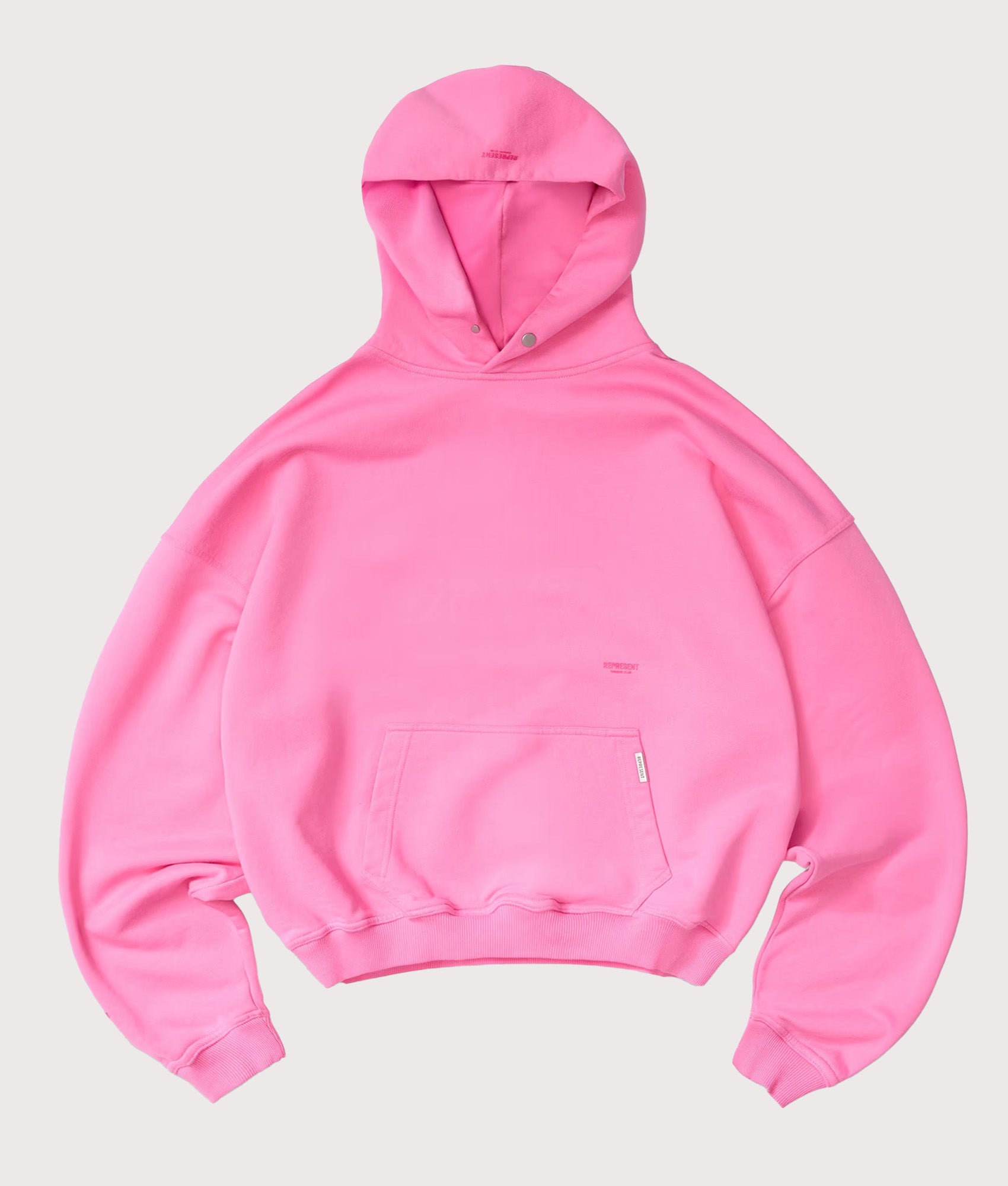 Represent Oversized Micro Owners Club Hoodie in Pink at EQVVS Menswear. Front shot.