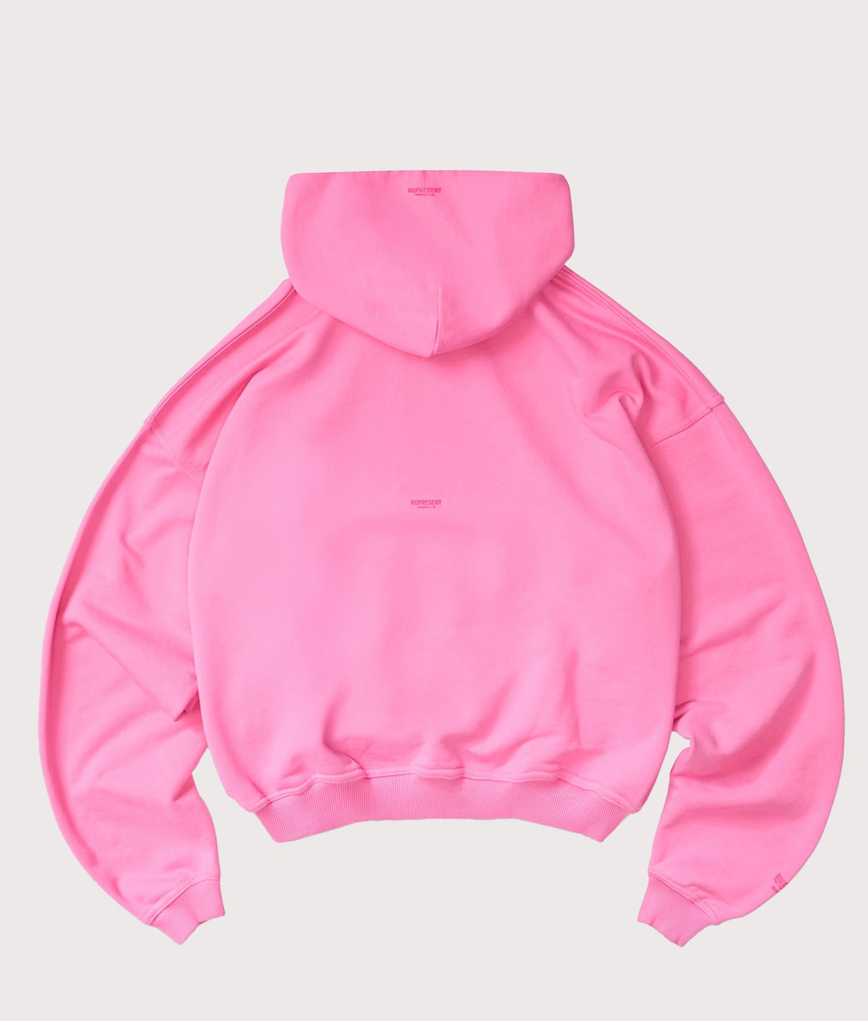 Represent Oversized Micro Owners Club Hoodie in Pink at EQVVS Menswear. Back shot.