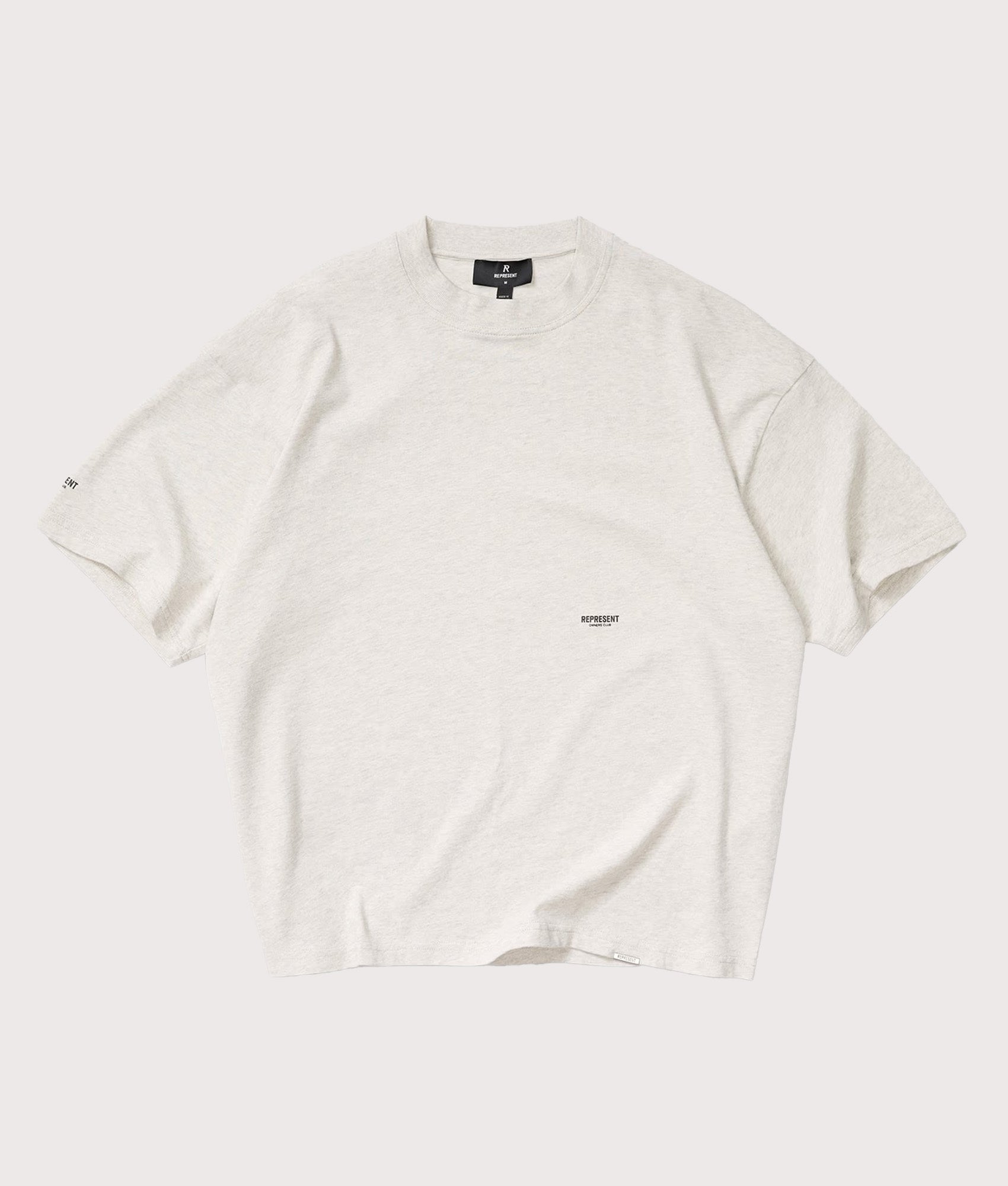 Represent Oversized Micro Owners Club T-Shirt in Cream Marl at EQVVS Menswear. Front shot.