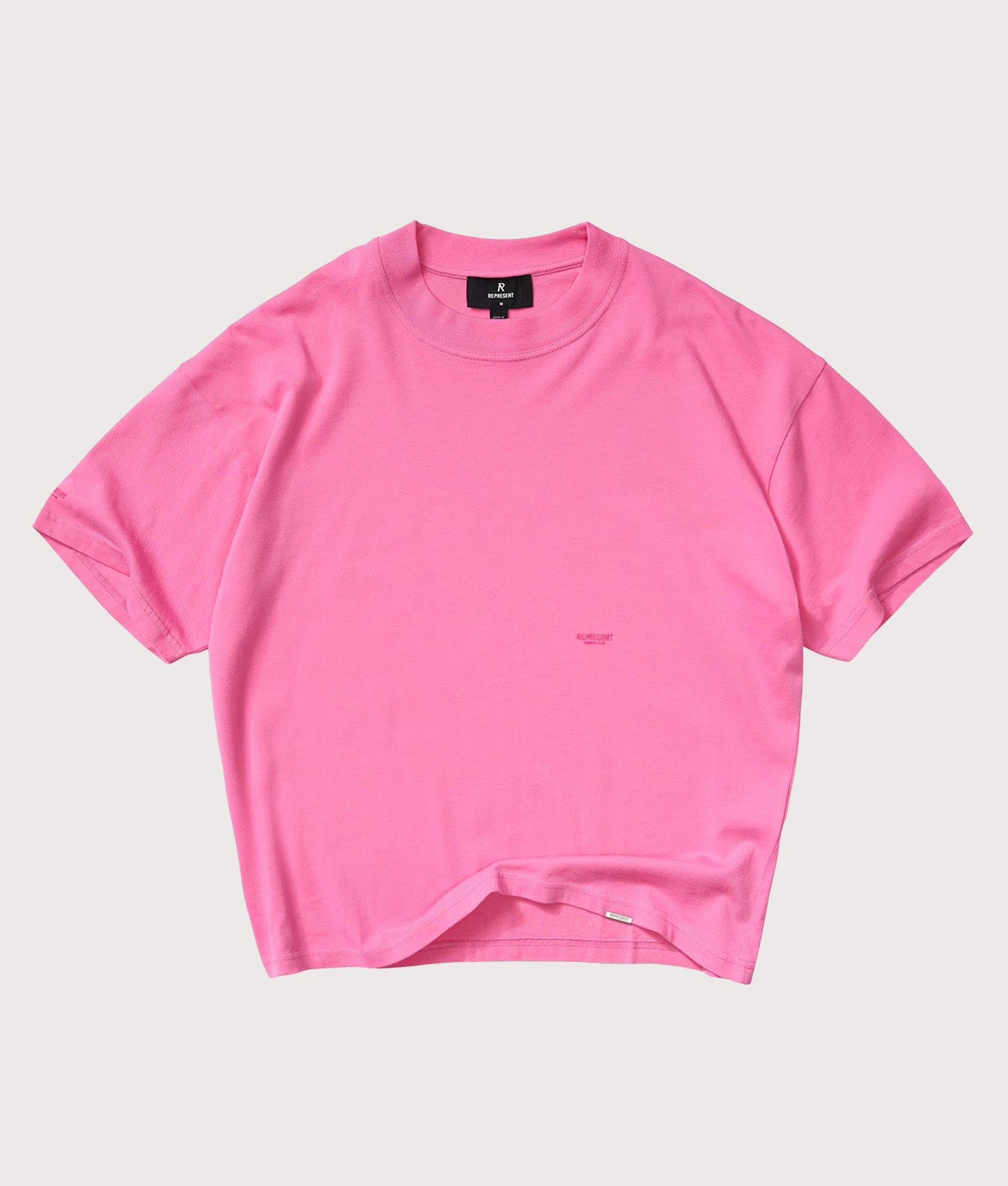 Represent Oversized Micro Owners Club T-Shirt in Pink at EQVVS Menswear. Front shot.