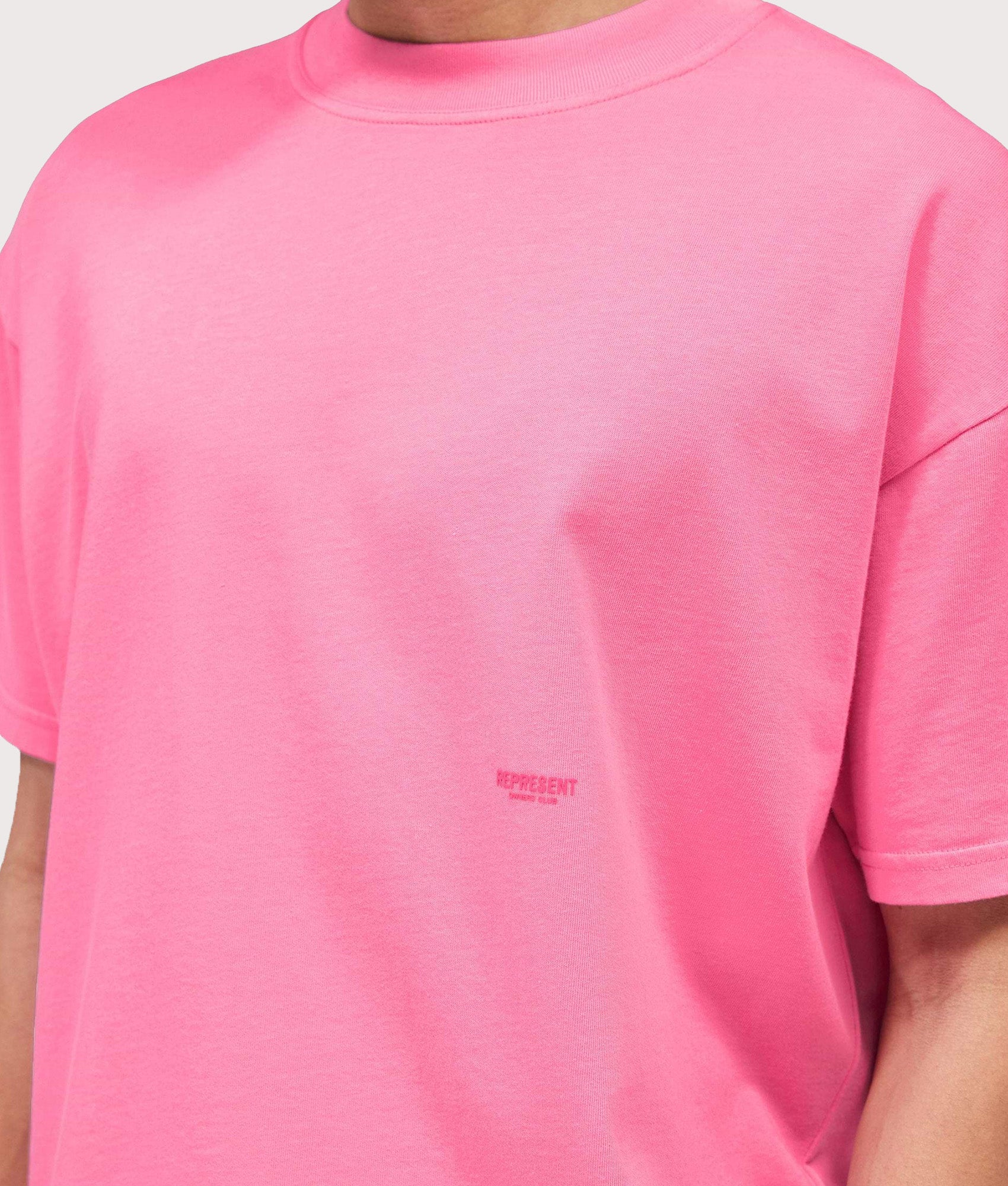 Represent Oversized Micro Owners Club T-Shirt in Pink at EQVVS Menswear. Detail shot.