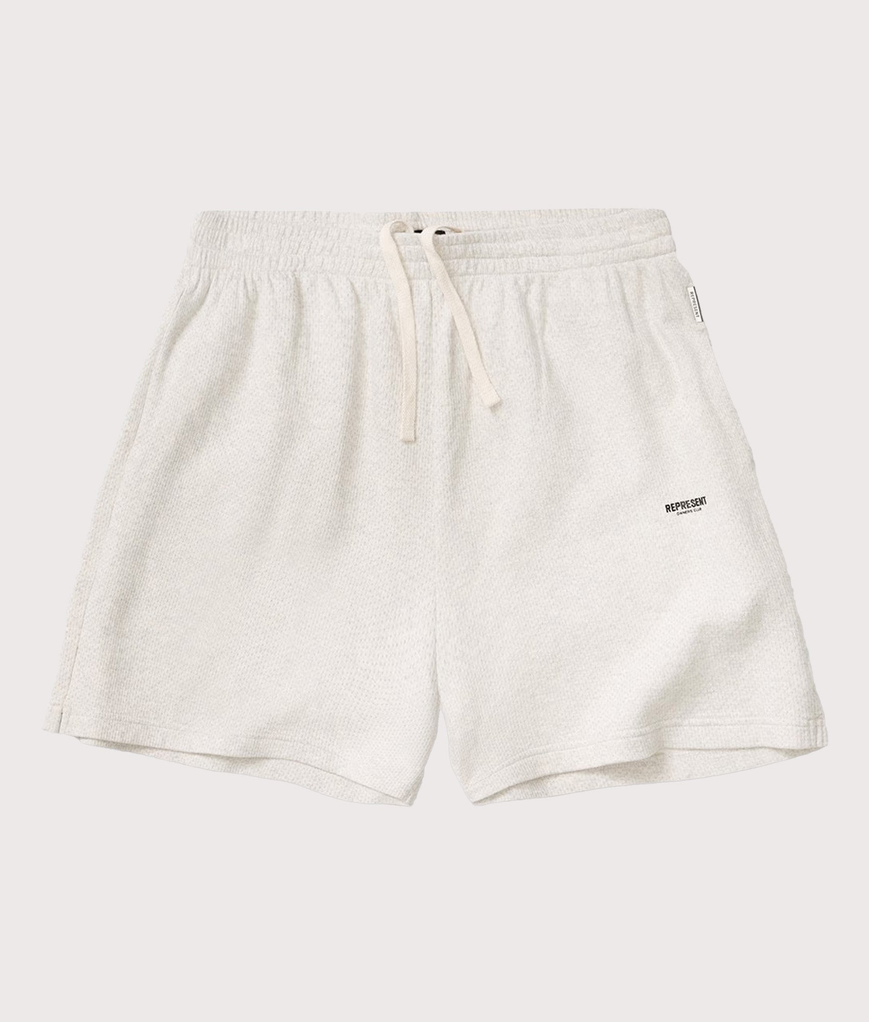 Represent Relaxed fit Micro Owners Club Shorts in Cream Marl at EQVVS Menswear. Front shot.