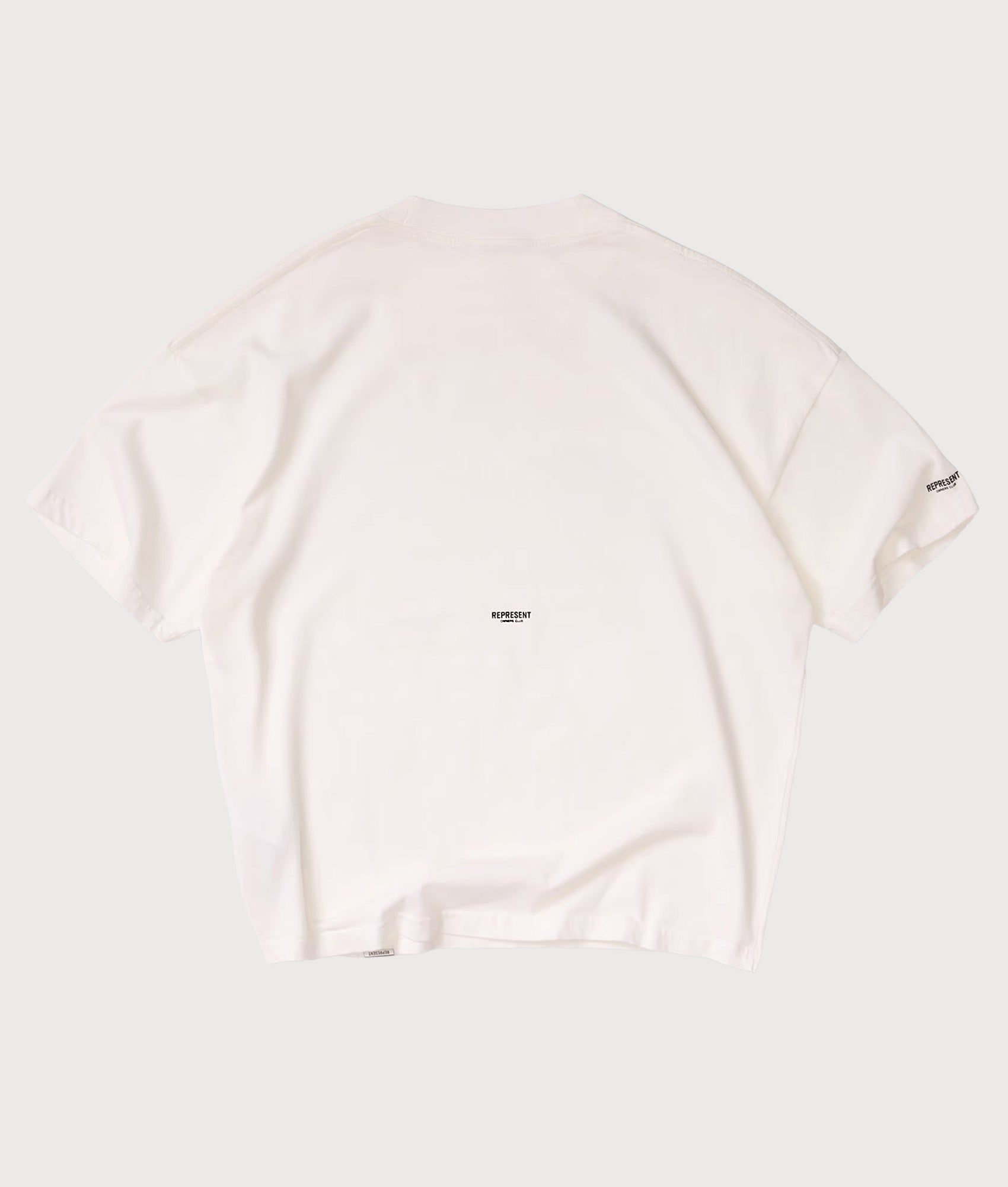 Represent Oversized Micro Owners Club T-Shirt in Flat White at EQVVS Menswear. Back shot.