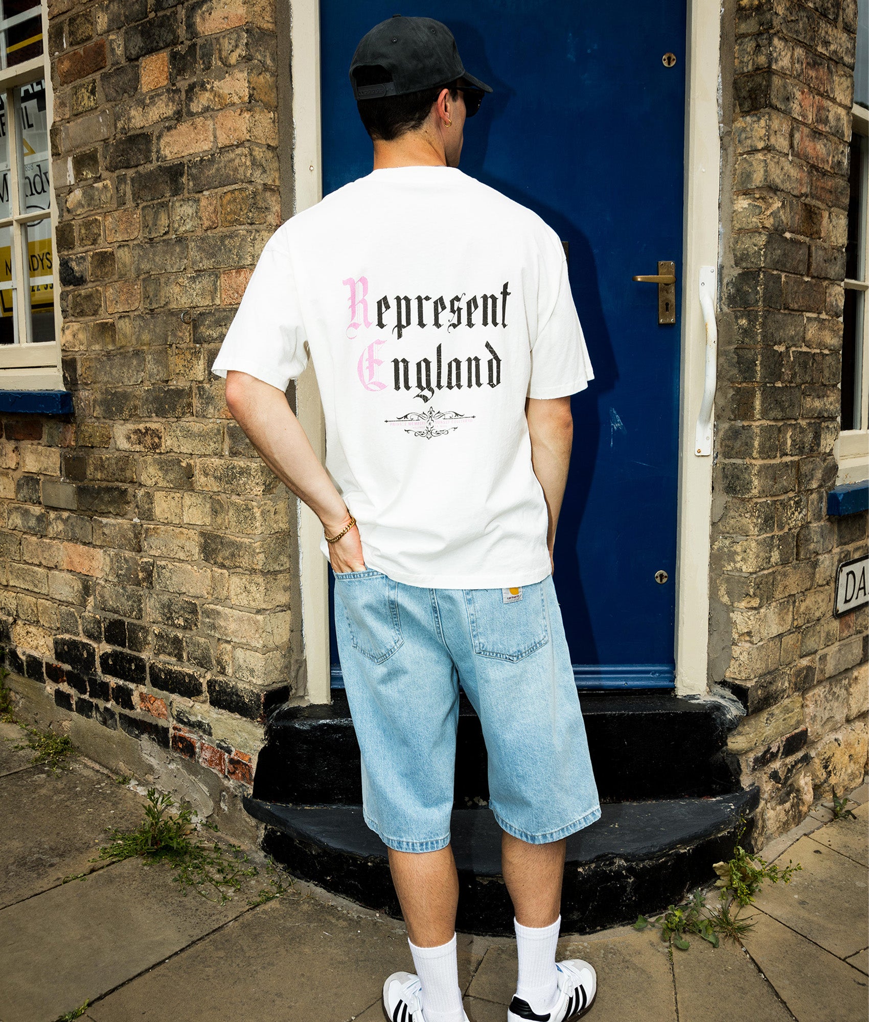 Represent Oversized Fit Private Members T-Shirt in Flat White at EQVVS Menswear. Campaign shot.