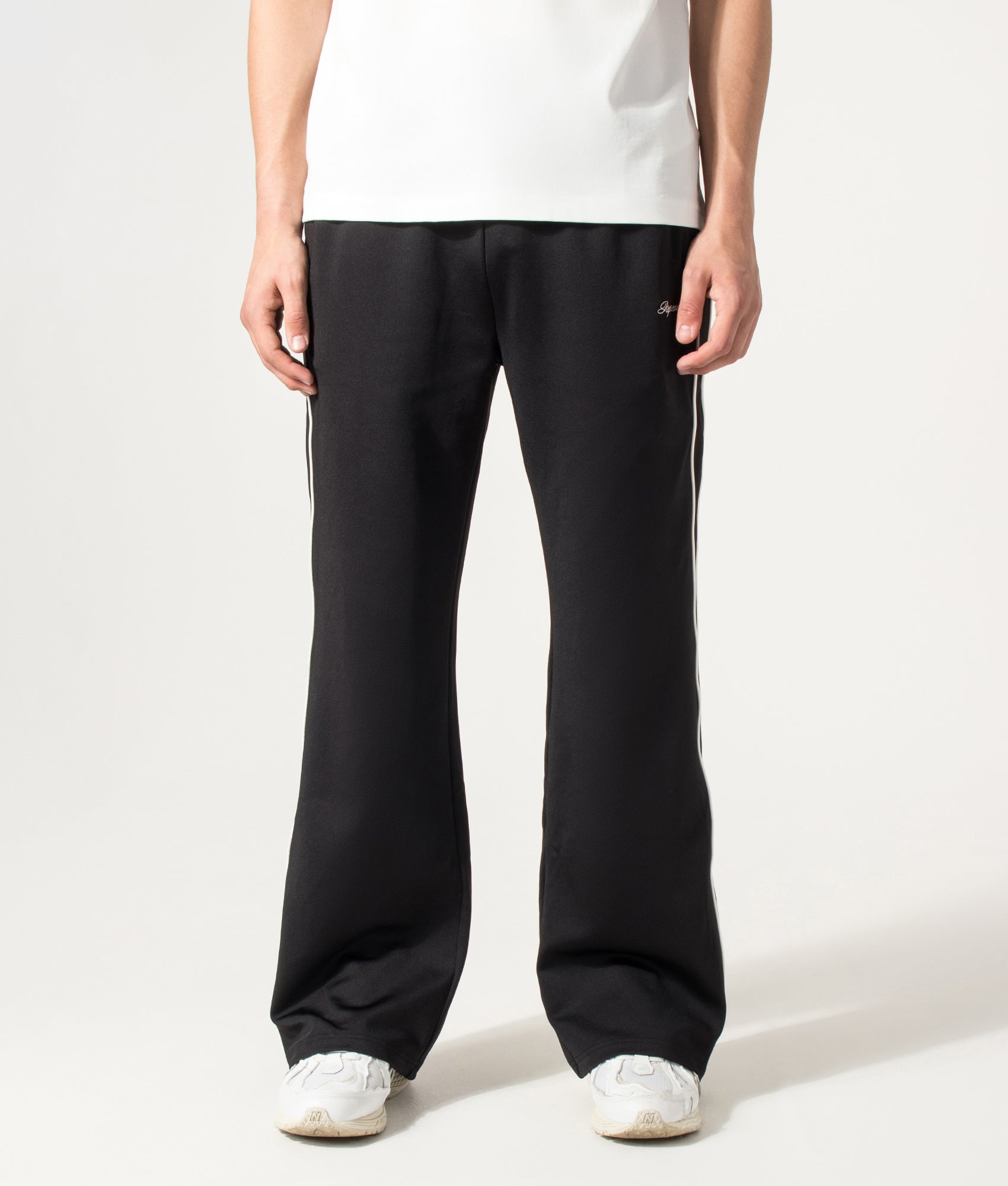 Represent Taped Track Pant in Black at EQVVS Menswear. Model front shot.