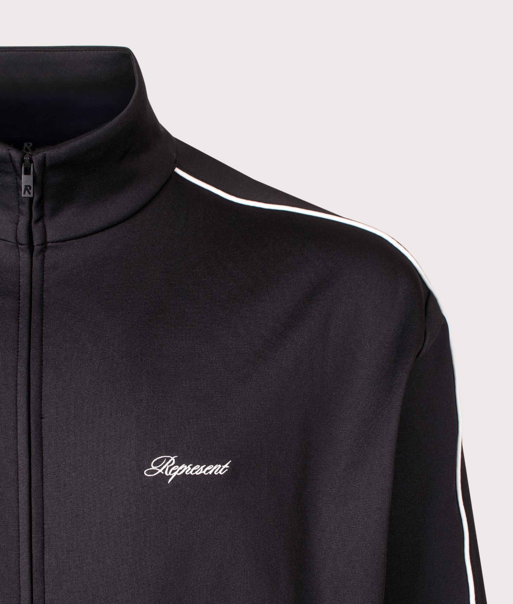 Represent Taped Track Top in Black at EQVVS menswear. Detail shot.