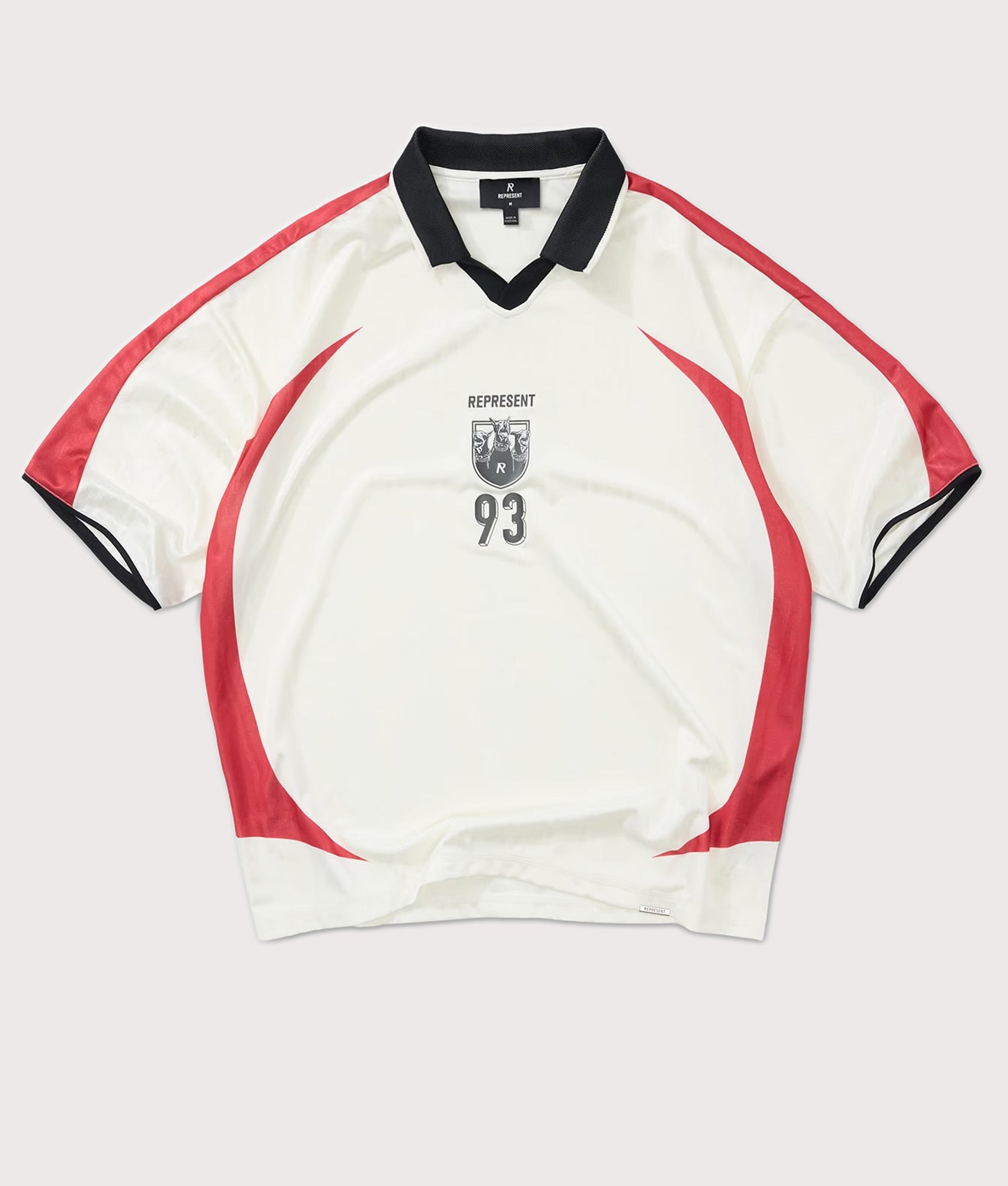 Represent Oversized Fit Spike Football Top in Flat White at EQVVS Menswear. Flat shot.
