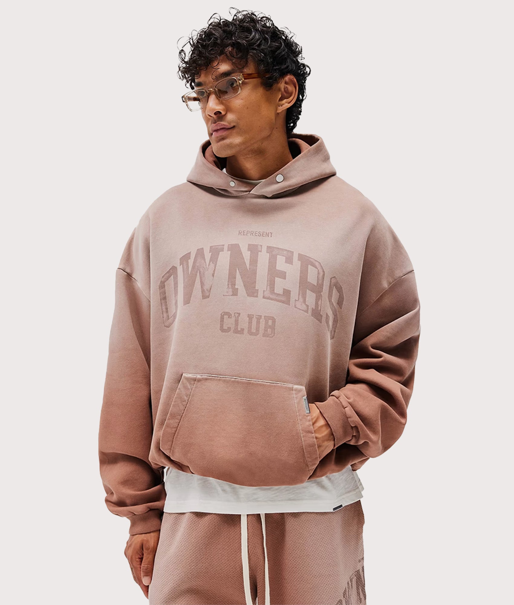 REPRESENT Oversized 2.0 Fit Owners Club Hoodie in Sienna at EQVVS Menswear. Model front shot.