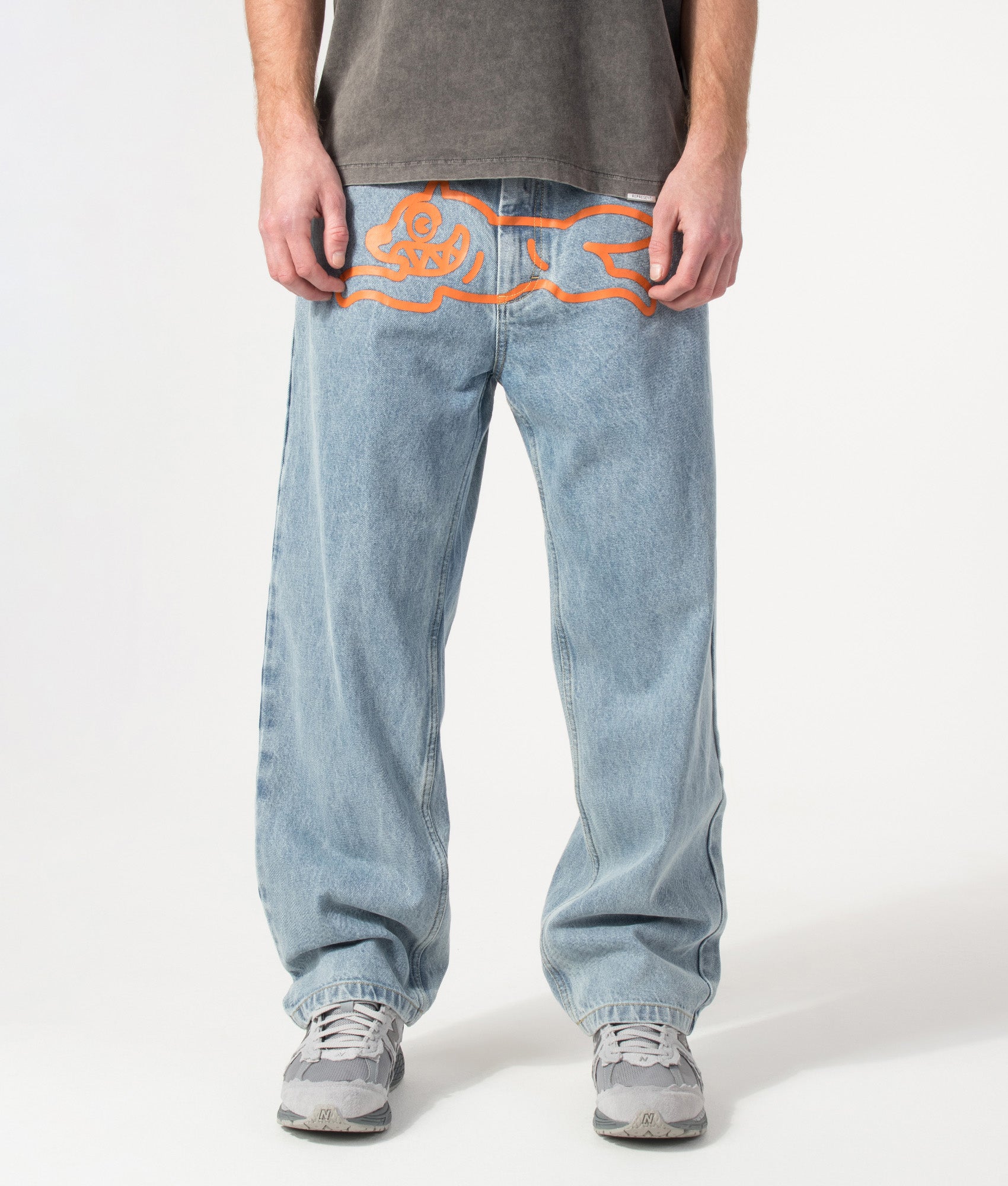 ICECREAM Running Dog Double Scoop Denim Jeans in Heavy Wash Blue at EQVVS Menswear. Model front shot.