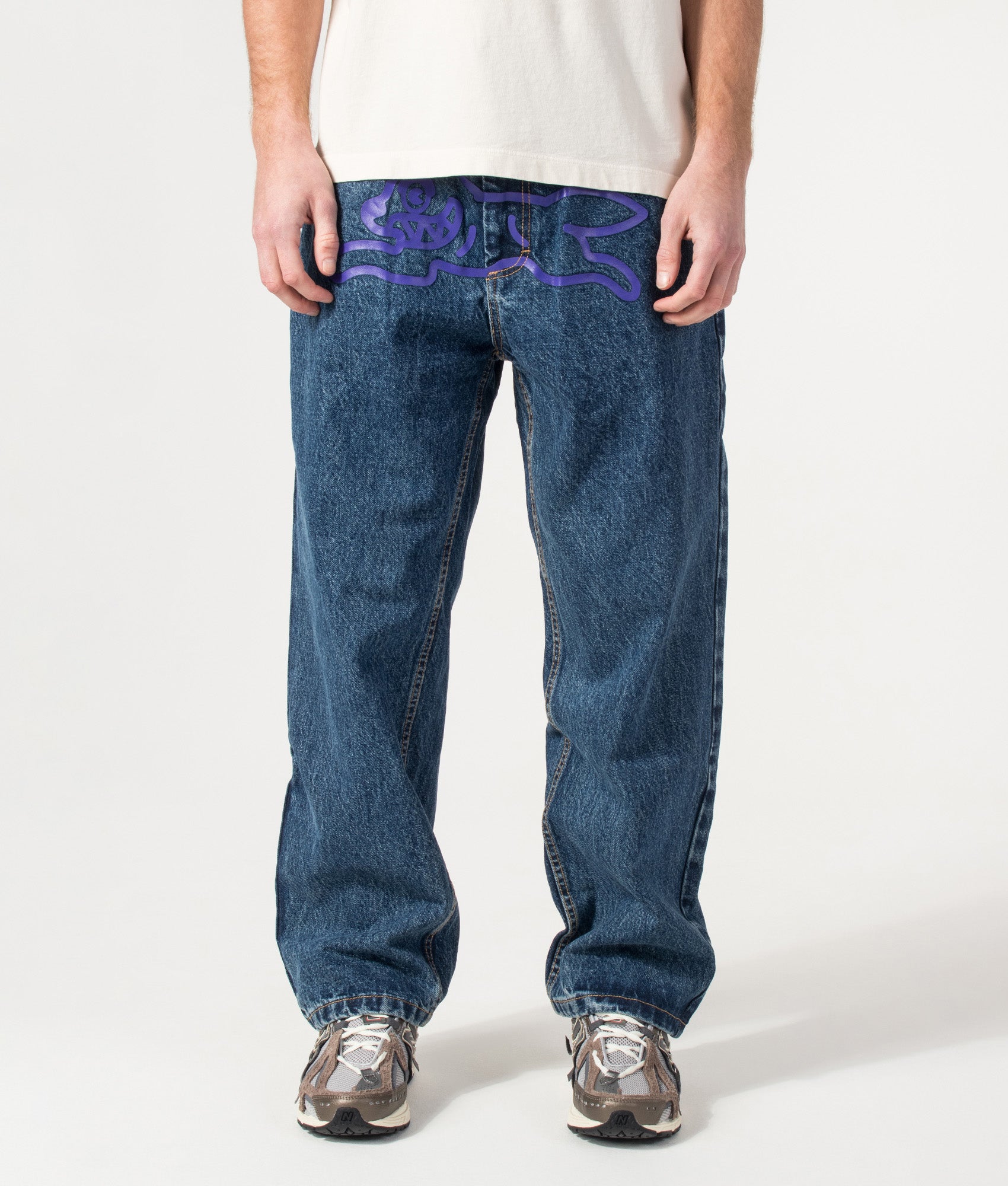 ICECREAM Running Dog Double Scoop Denim Jeans in Mid Wash Blue at EQVVS Menswear. Model front shot.