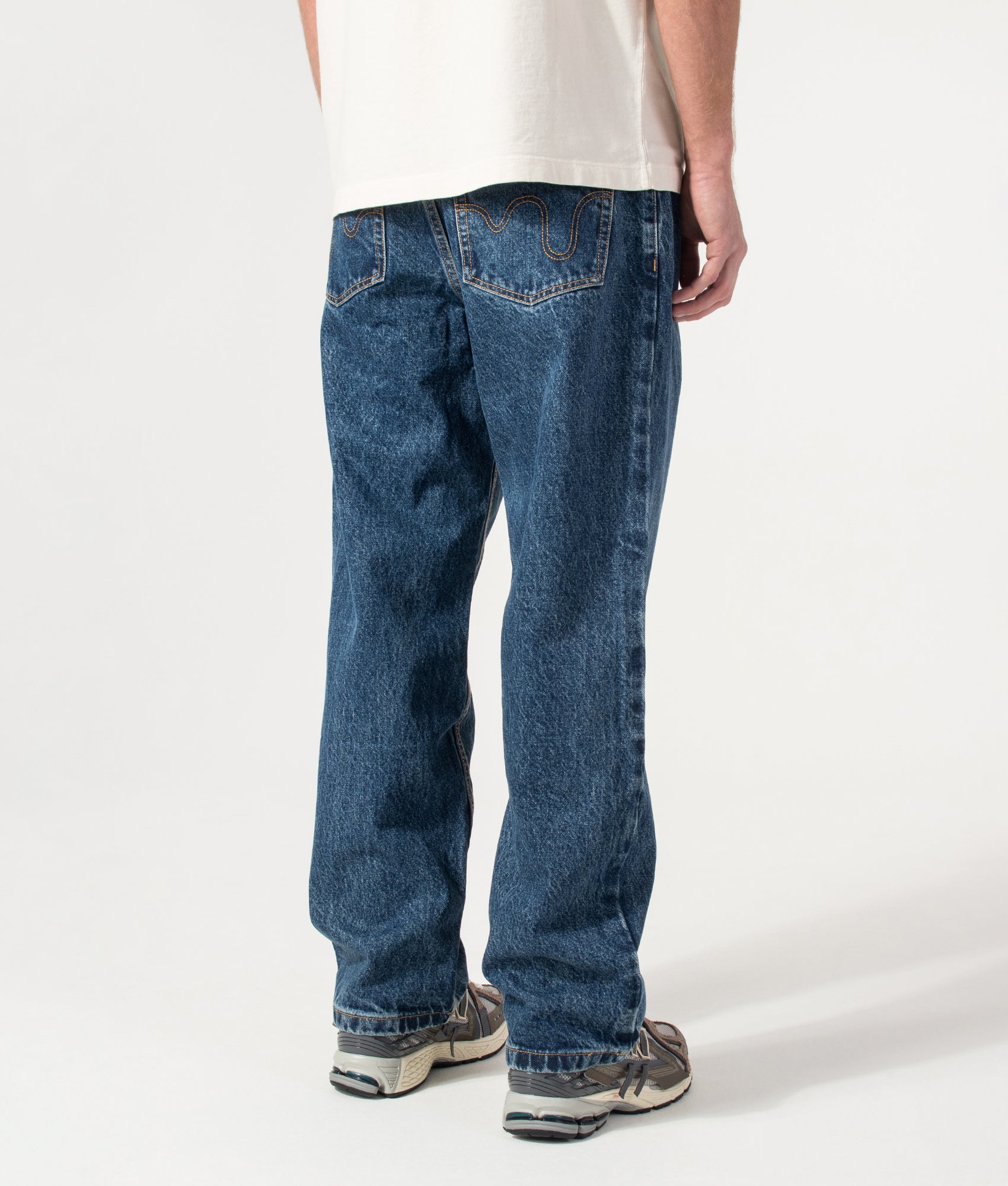 ICECREAM Running Dog Double Scoop Denim Jeans in Mid Wash Blue at EQVVS Menswear. Model back shot.