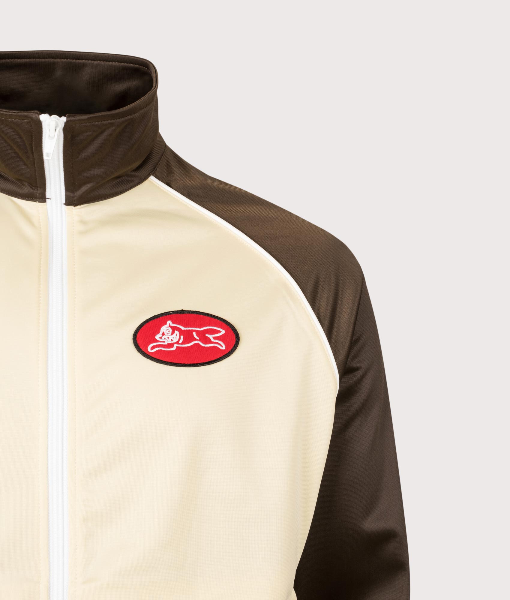 Running Dog Zip Through Track Top. Shot by EQVVS. Detail shot.