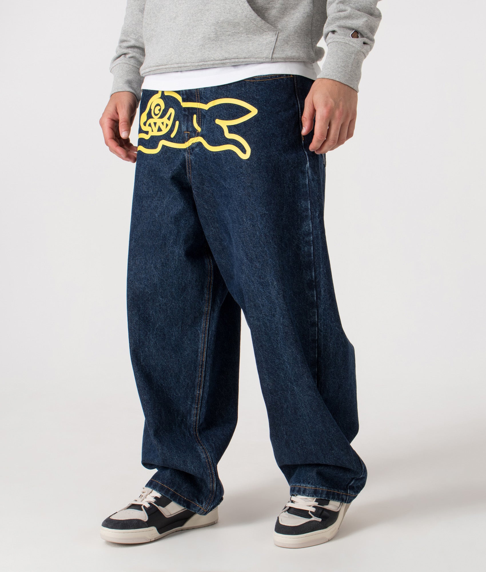 Running Dog Triple Scoop Denim Pants by ICECREAM in Dark Wash. Shot by EQVVS. Front angled shot.