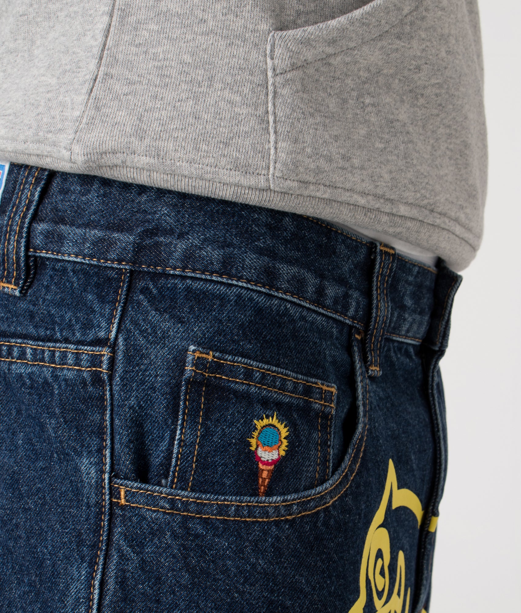 Running Dog Triple Scoop Denim Pants by ICECREAM in Dark Wash. Shot by EQVVS. Front detail shot.