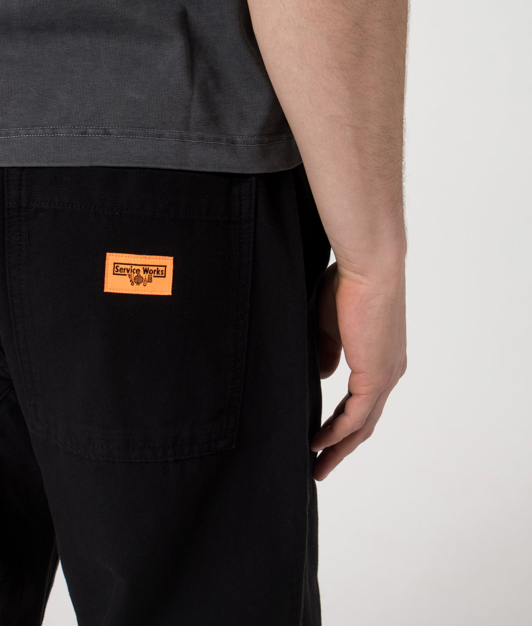 Service Works Regular Fit Canvas Chef Pants in Black at EQVVS Menswear. Detail shot.