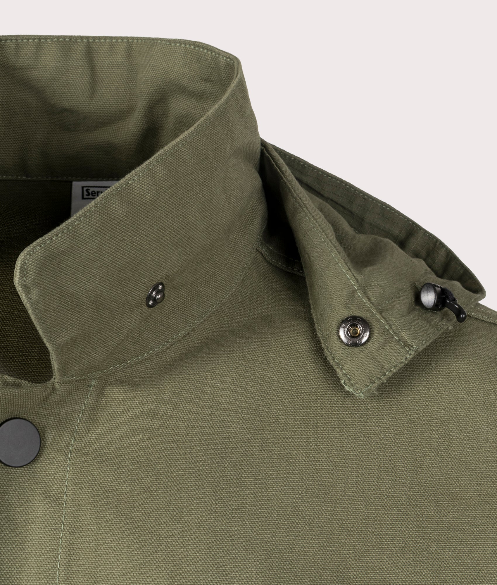 Gardener Jacket by Service Works in Forest. Shot by EQVVS. Detail collar shot.