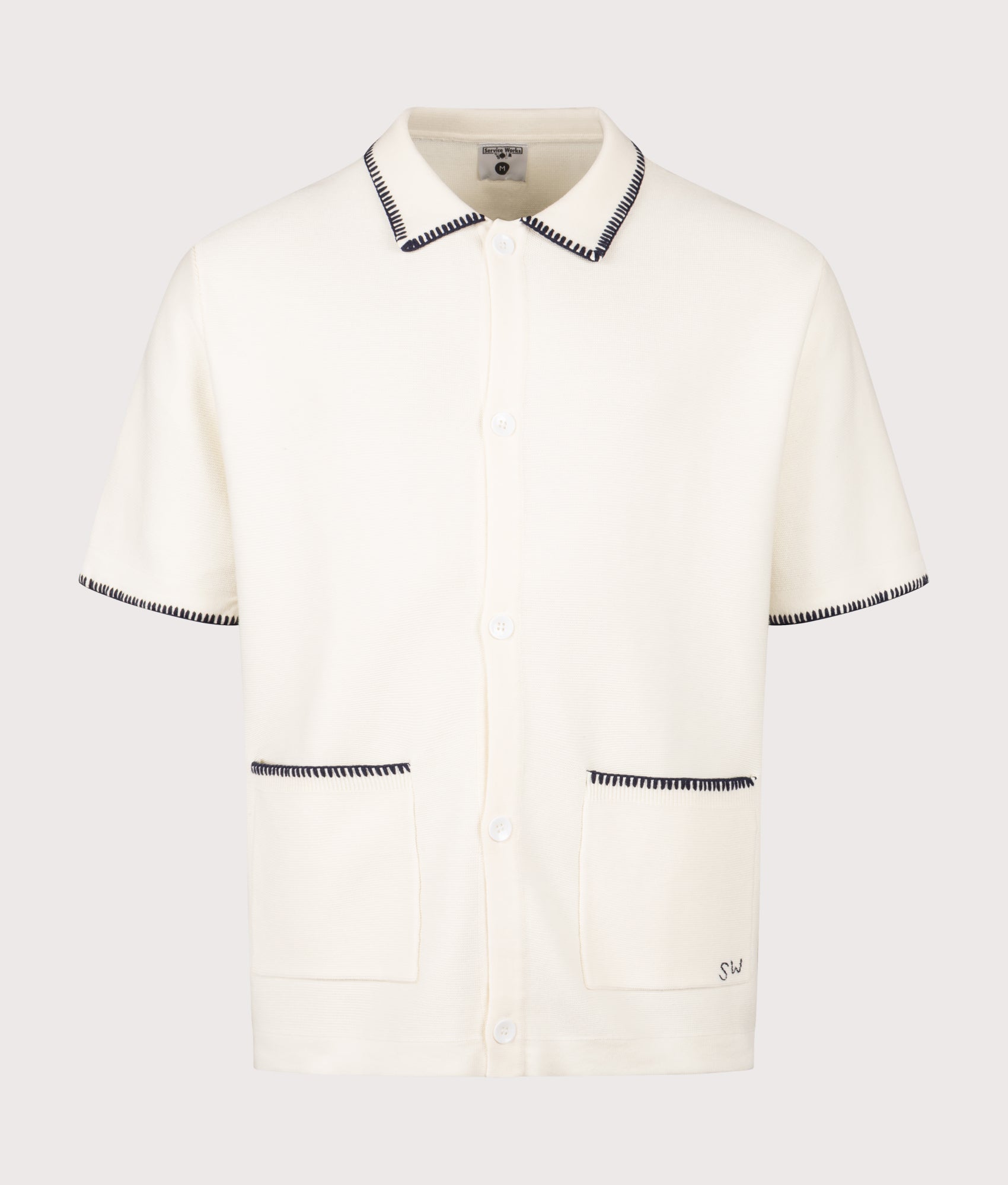 Service Works Blanket Stitch Short Sleeve Knitted Shirt in Off White at EQVVS Menswear. Front shot.