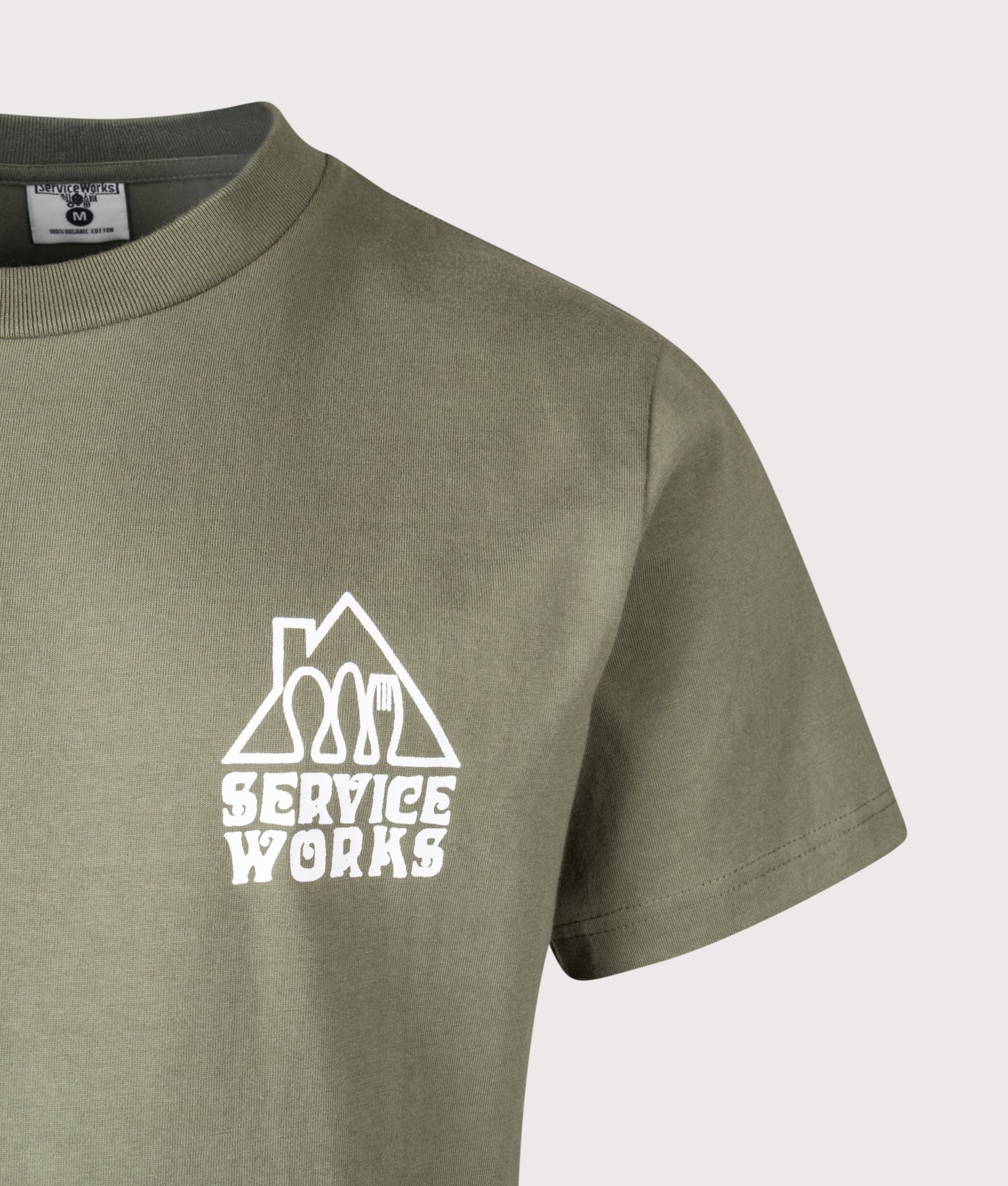 Services Works Home Comforts T-Shirt in Olive at EQVVS Menswear. Detail shot.