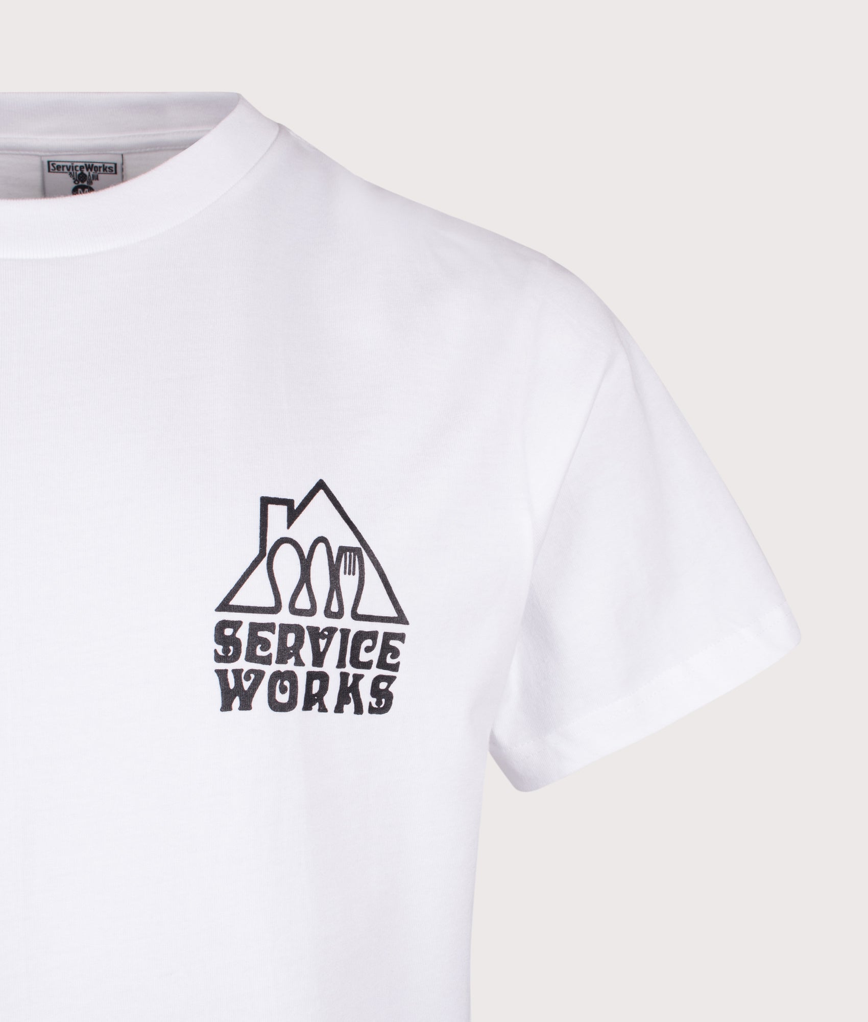 Services Works Home Comforts T-Shirt in White at EQVVS Menswear. Detail shot.