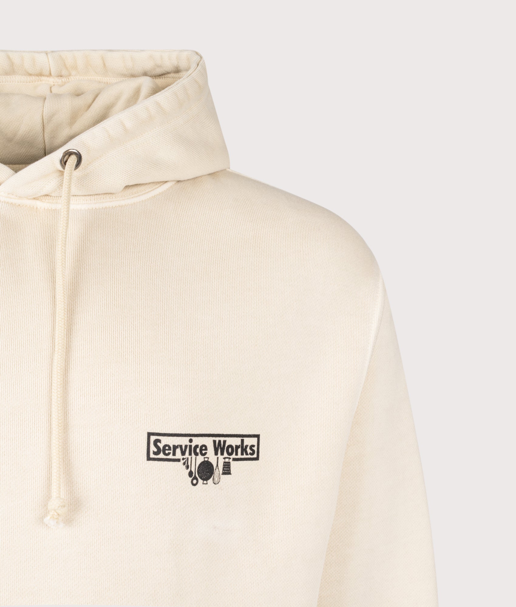 Service Works Loopback Trademark Hoodie in Natural at EQVVS Menswear. Detail shot.