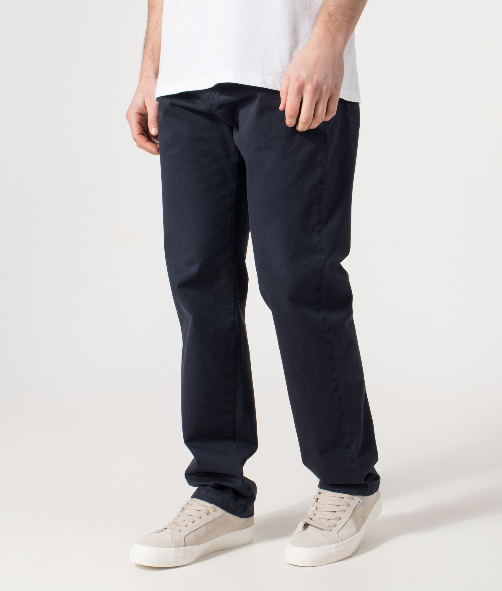 PS Paul Smith Relaxed Fit Tapered Jeans in Blue at EQVVS Menswear. Angled model front shot.
