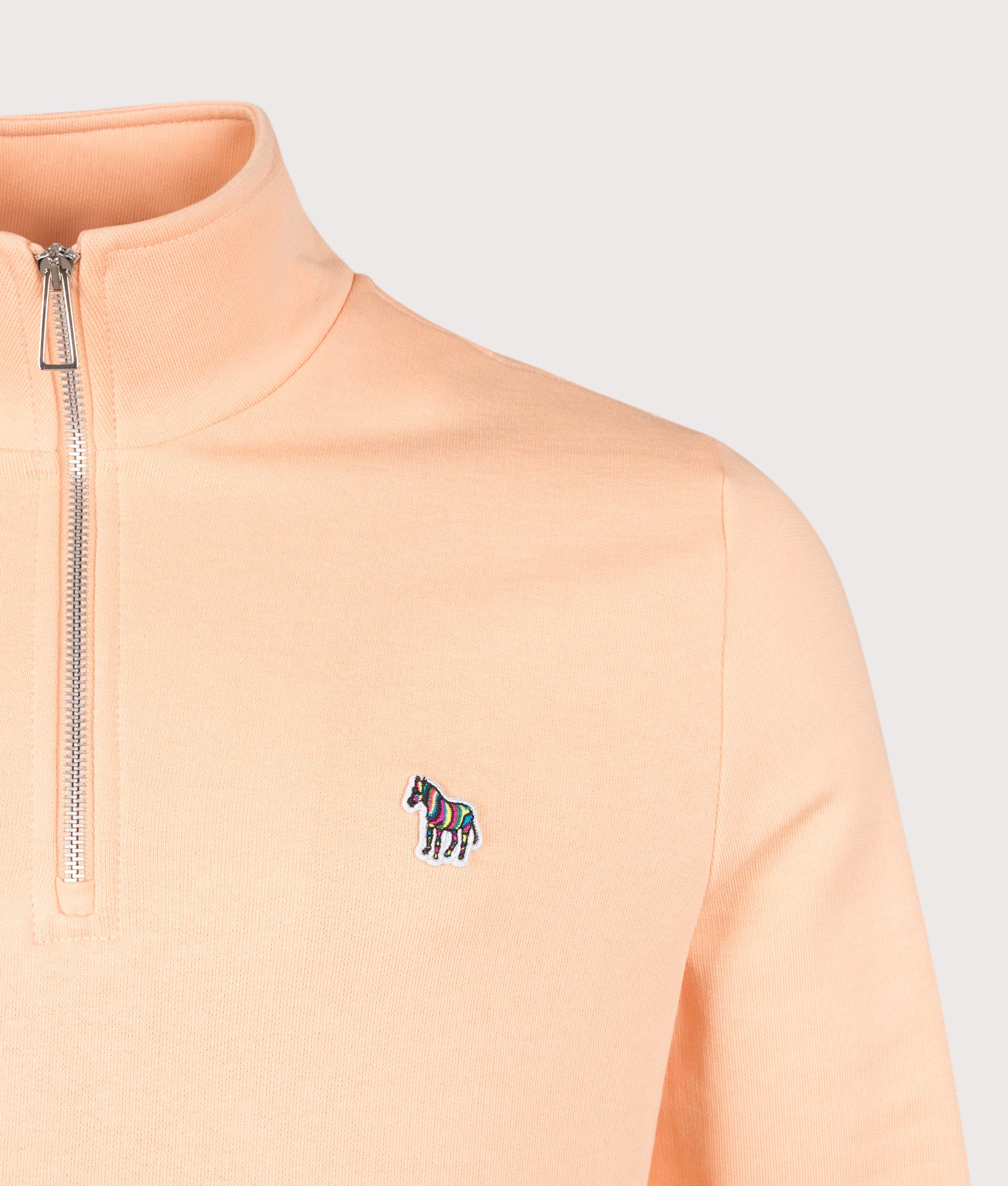 PS Paul Smith Quarter Zip Zebra Sweatshirt in Orange at EQVVS Menswear. Detail shot.