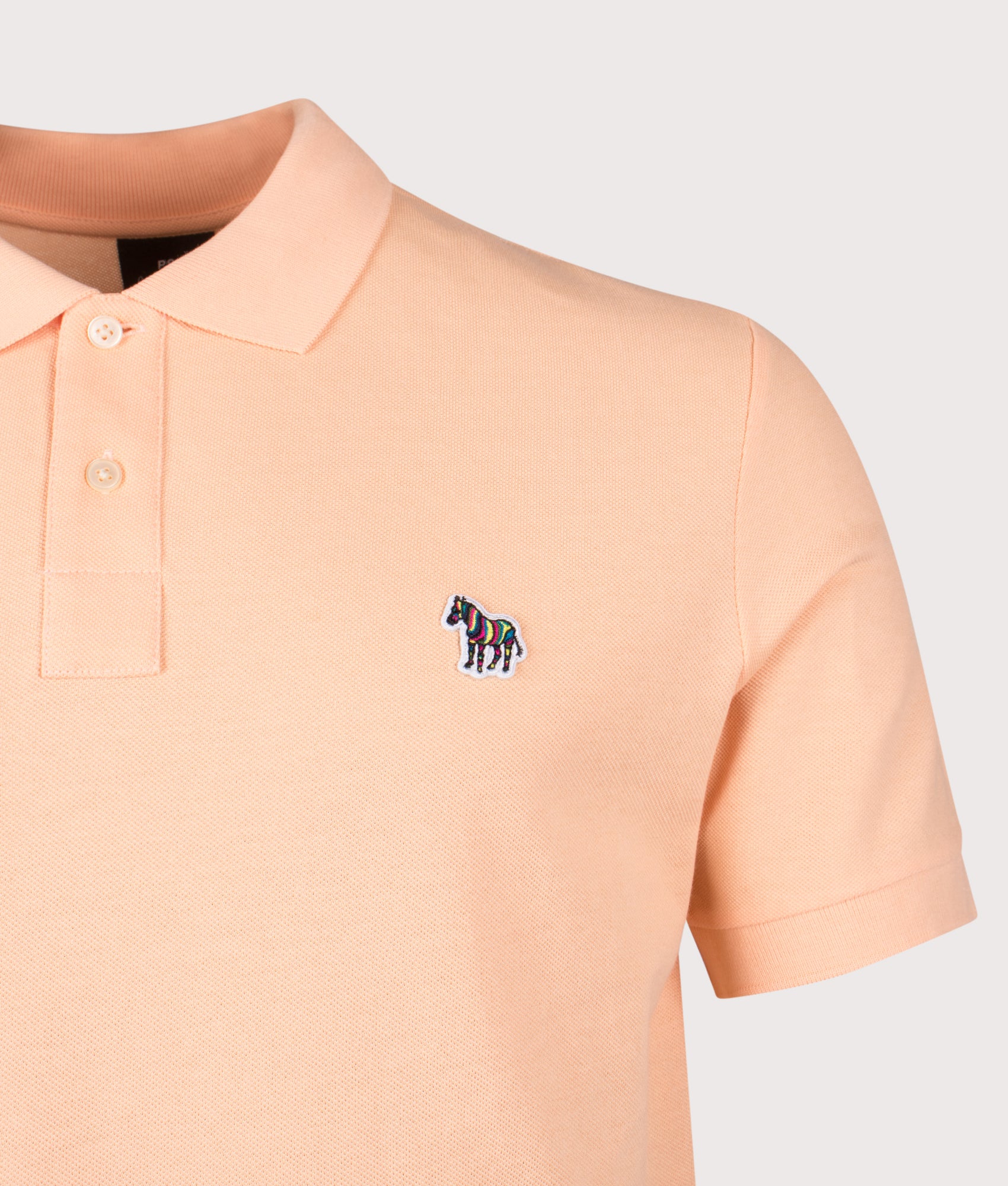 PS Paul Smith Zebra Polo Shirt arrives in Orange at EQVVS Menswear. Detail shot.