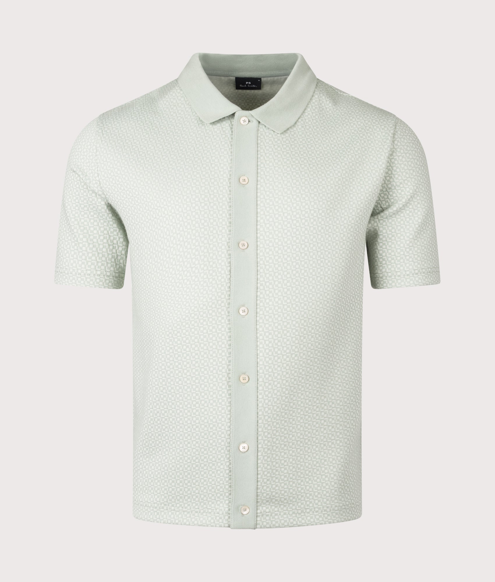 PS Paul Smith Button Front Polo Shirt in Green at EQVVS Menswear. Front shot.