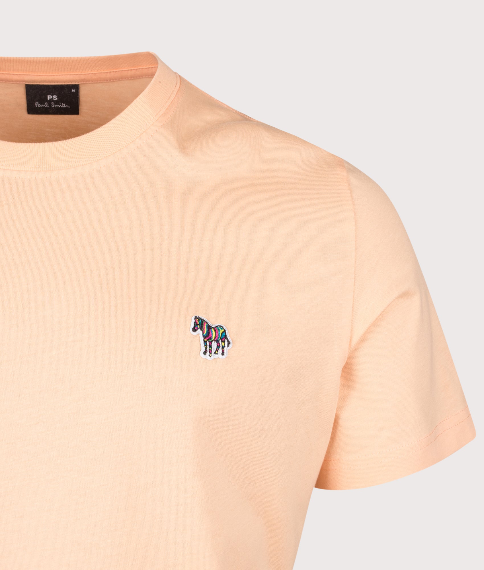 PS Paul Smith Zebra T-Shirt in Orange at EQVVS Menswear. Detail shot.