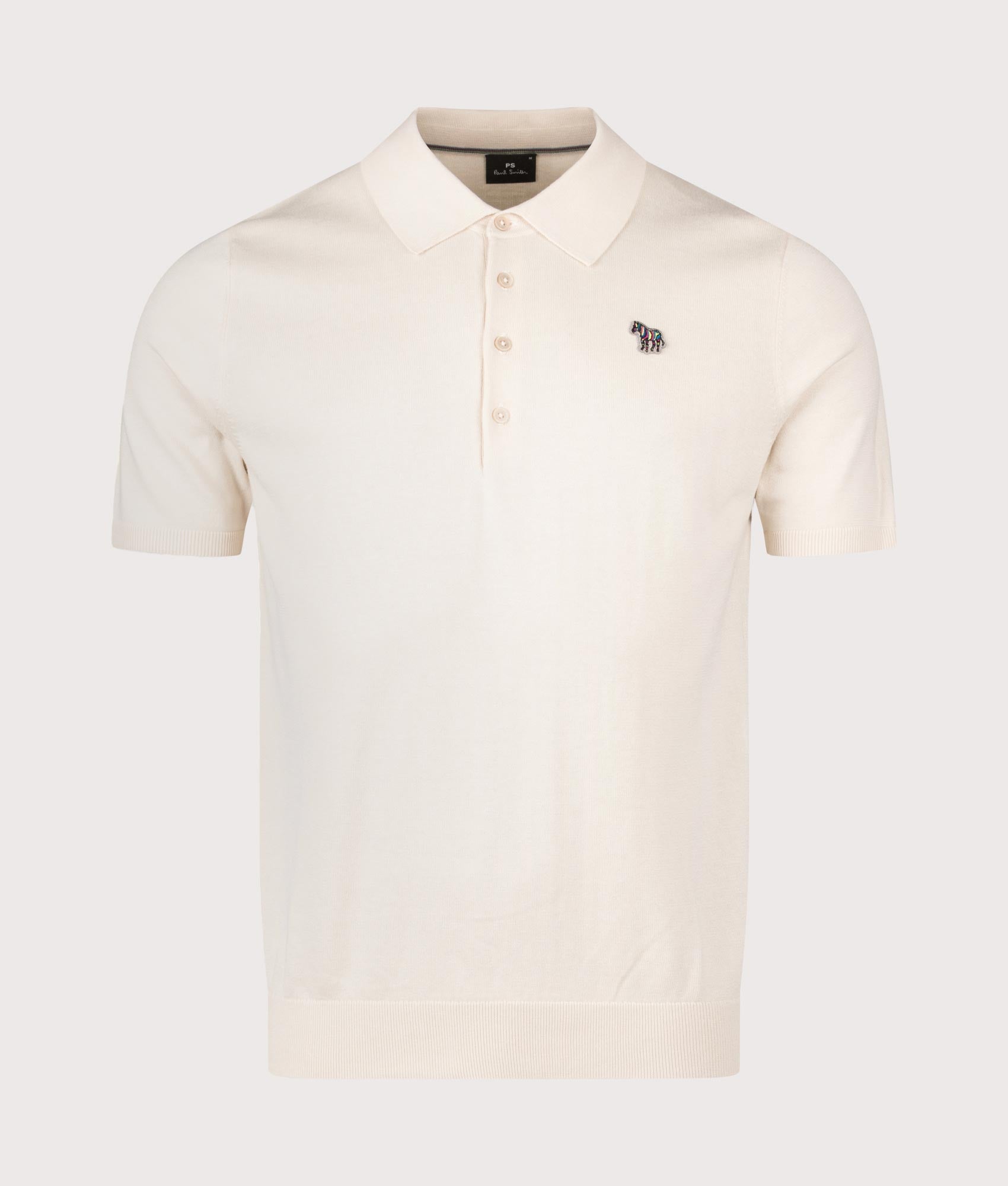 PS Paul Smith Zebra Badge Polo Shirt in White at EQVVS Menswear. Front shot.