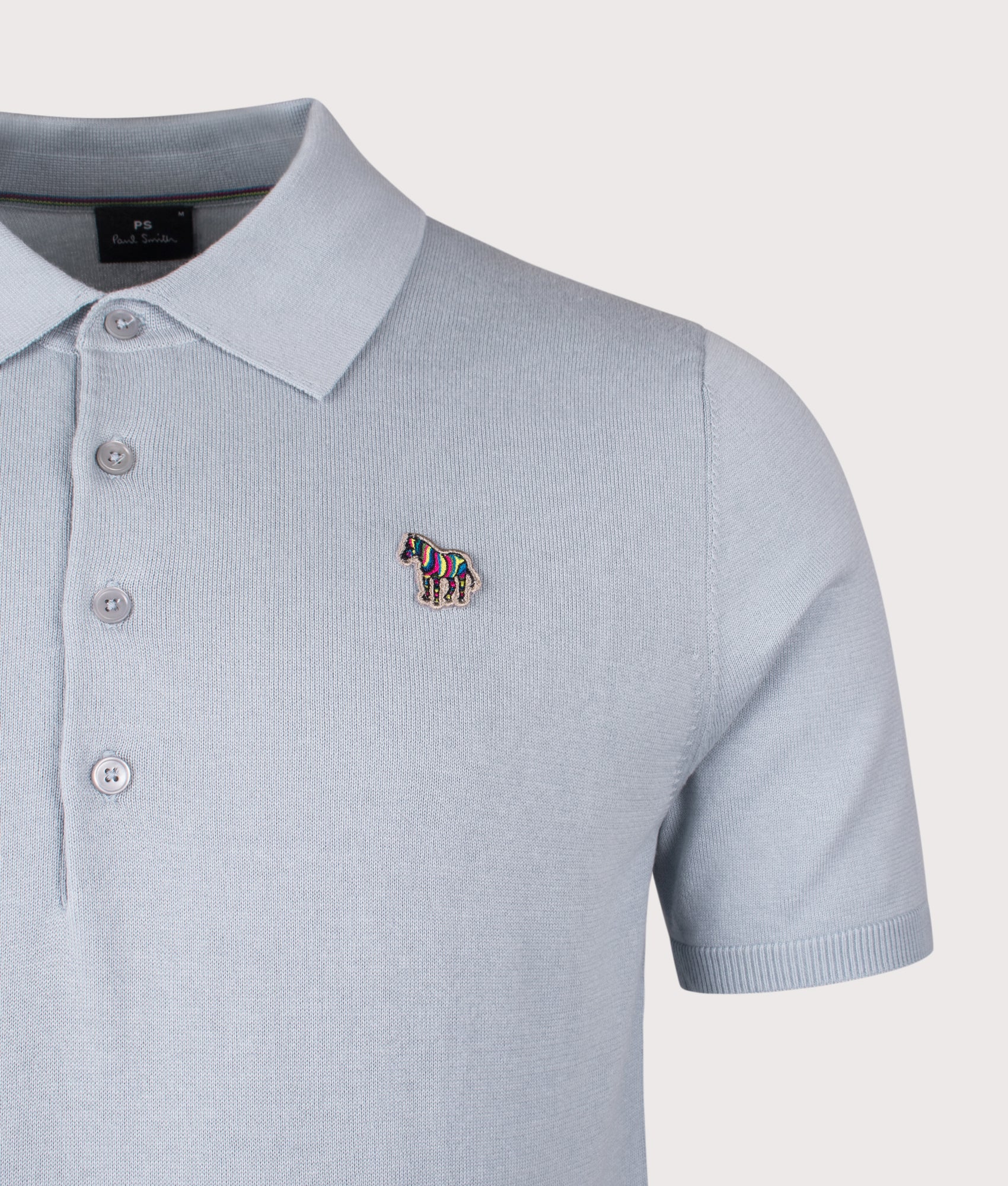 PS Paul Smith Zebra Badge Polo Shirt  in Blue at EQVVS Menswear. Detail shot.
