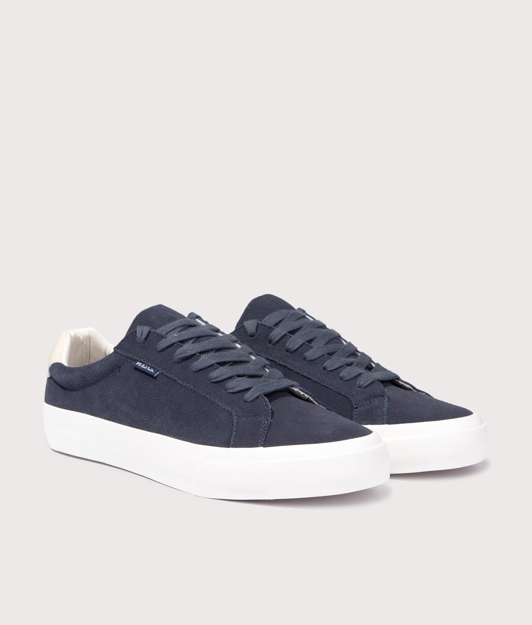 PS Paul Smith Amos Trainers in Navy Blue at EQVVS Menswear. Angled front shot.