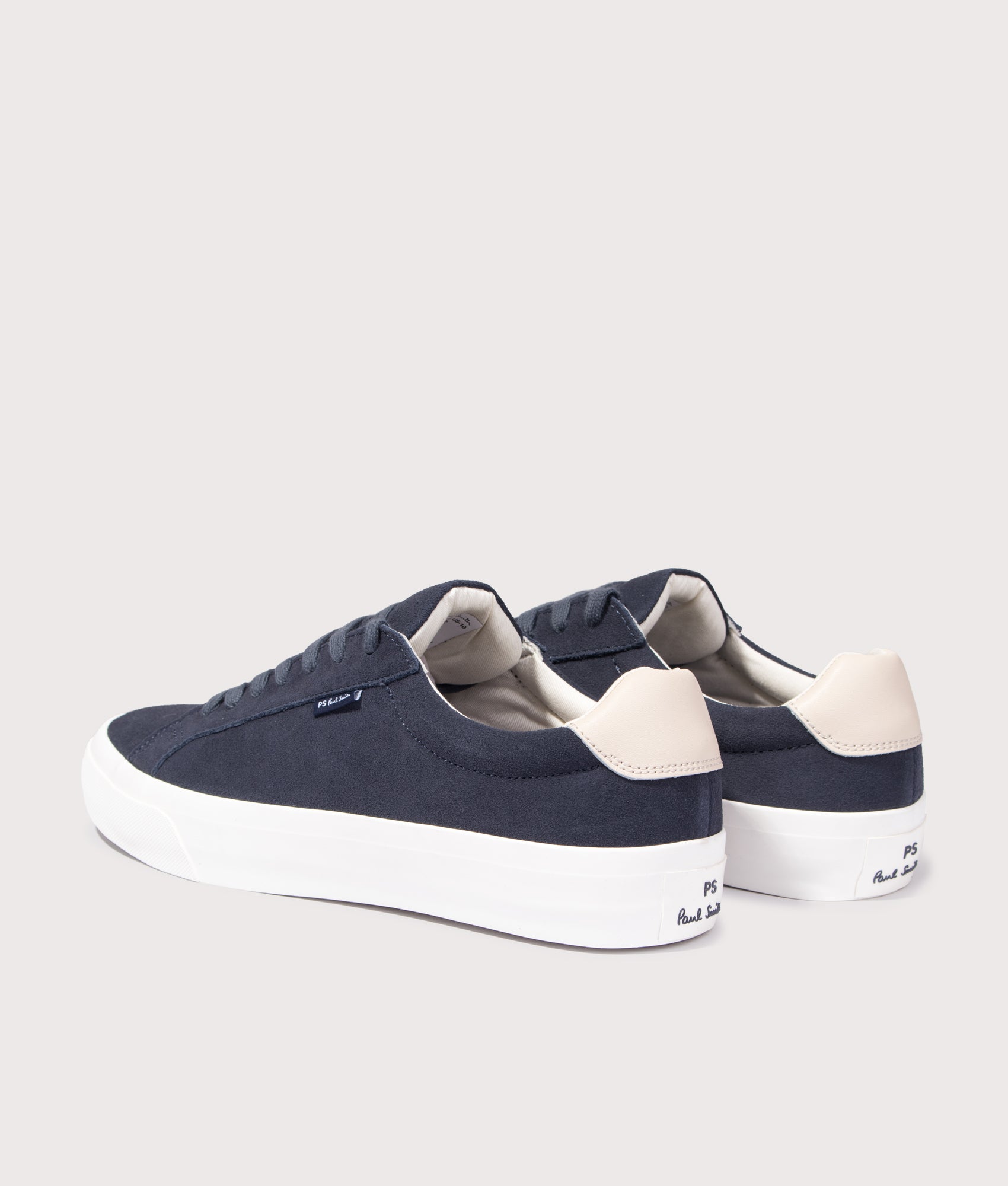 PS Paul Smith Amos Trainers in Navy Blue at EQVVS Menswear. Angled back shot.