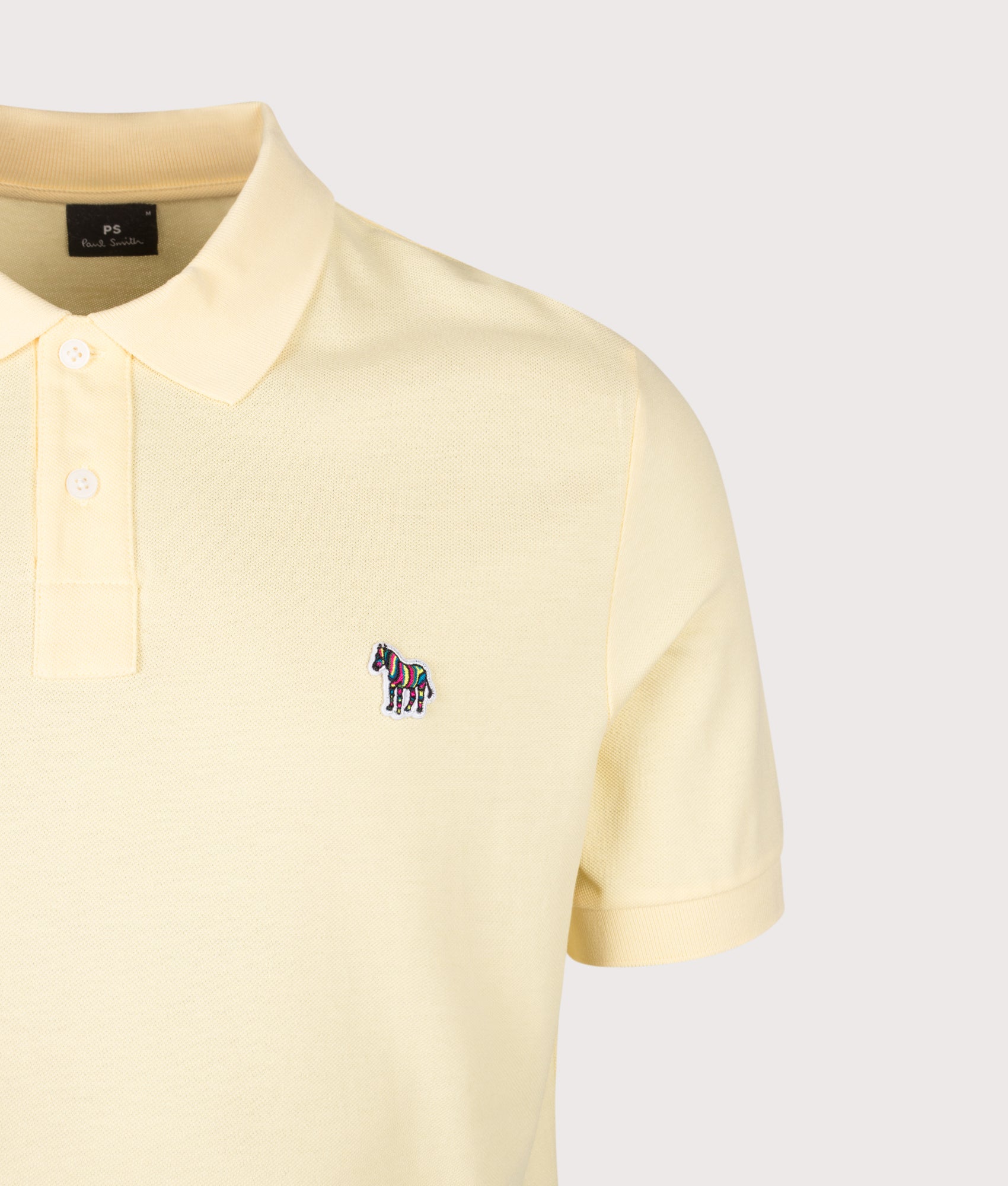 PS Paul Smith Zebra Polo Shirt in Yellow at EQVVS Menswear. Detail shot.
