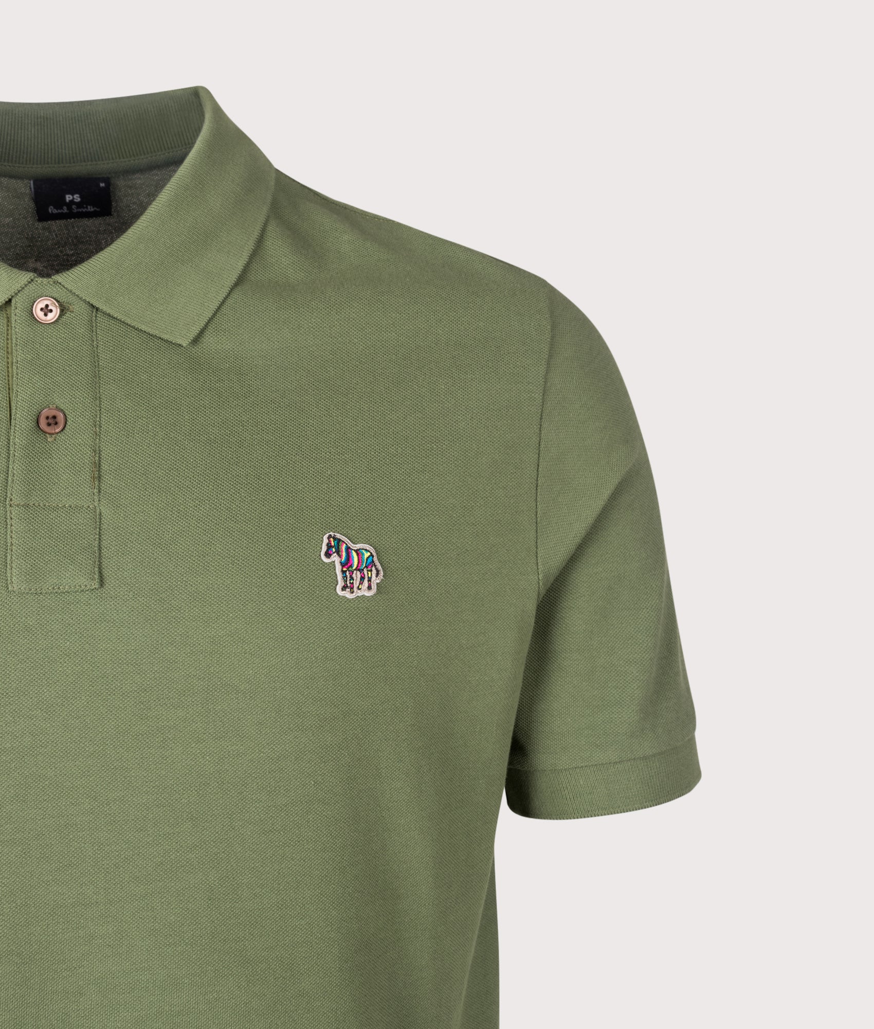 PS Paul Smith Zebra Polo Shirt in Green at EQVVS Menswear. Detail shot.